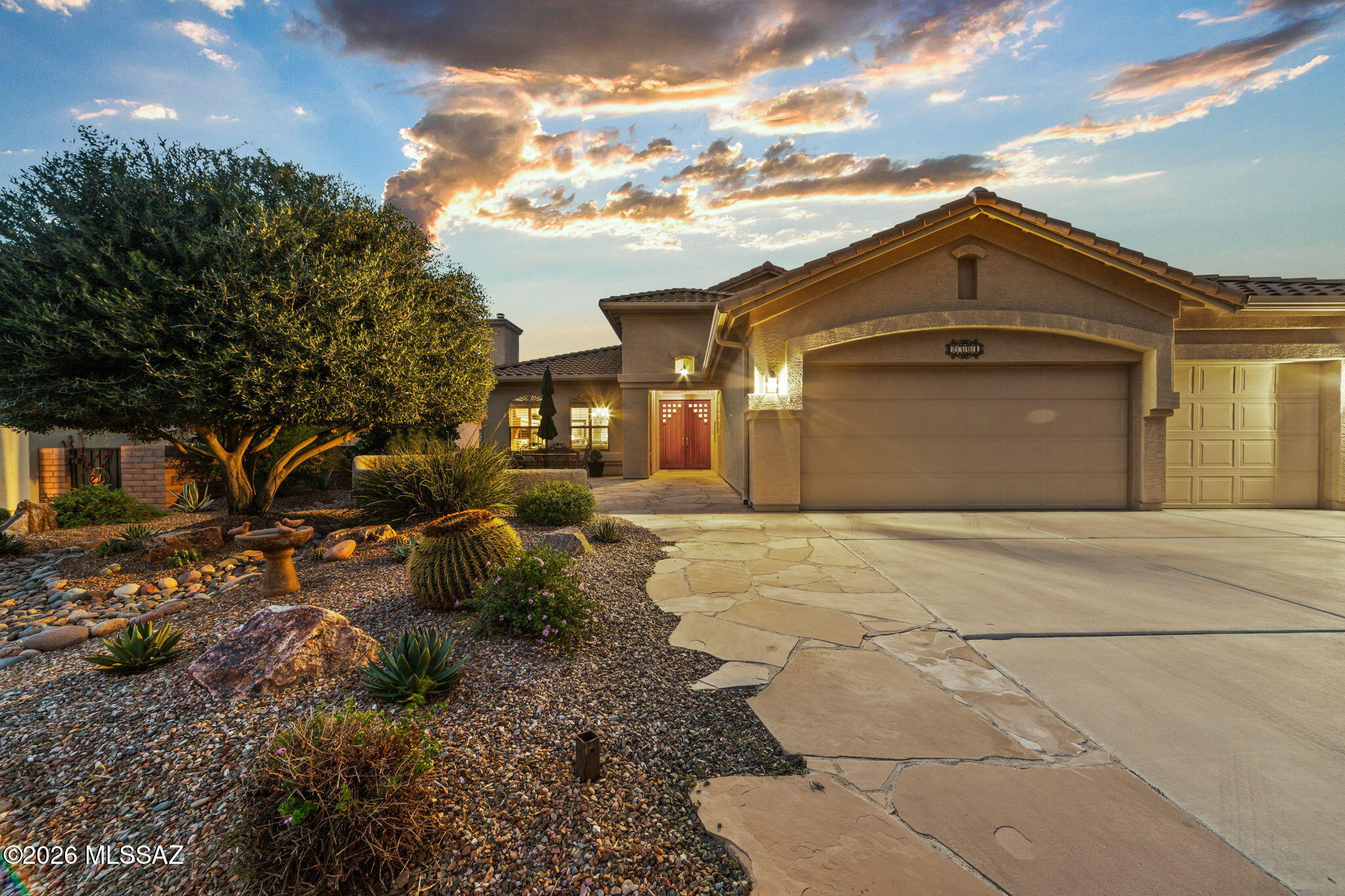 This Durango model, offering an impressive 3,418 sq. ft. of flexible living space was designed to spread out, entertain, and fully enjoy the active lifestyle and retirement lifestyle Quail Creek is known for.
A beautiful limestone front patio and double door entry welcome you into an elegant formal living and dining area highlighted by a gas fireplace, abundant natural light, and custom shutters. The gourmet kitchen features granite countertops, stainless steel appliances, a gas cooktop, built in desk, butler's pantry, and walk-in pantry. An adjoining family room offers wall-to-wall built ins that beautifully complement the homes esthetics.
The main level features two spacious bedrooms and two full baths, while the upstairs offers two additional bedrooms and a full bath; perfectly suited as a private guest casita. The versatile upstairs space has also been used as a media room, home office, fitness area, hobby space, or whatever best fits your lifestyle.
Three separate HVAC systems provide year round comfort and added efficiency, allowing you to close off areas of the home when they're not in use. The outdoor living is equally impressive. The expansive covered patio features a "cocktail pebble tech spool" the perfect place to cool off or unwind, along with an outdoor kitchen, BBQ grill, and fire pit that just might make yours the most popular house on the block.
Additional conveniences include a whole home water softener, central vacuum, and spacious 3car garage. With exceptional flexibility, generous living spaces, and fantastic indoor|outdoor entertaining, this home offers room to live Quail Creek life exactly the way you want.