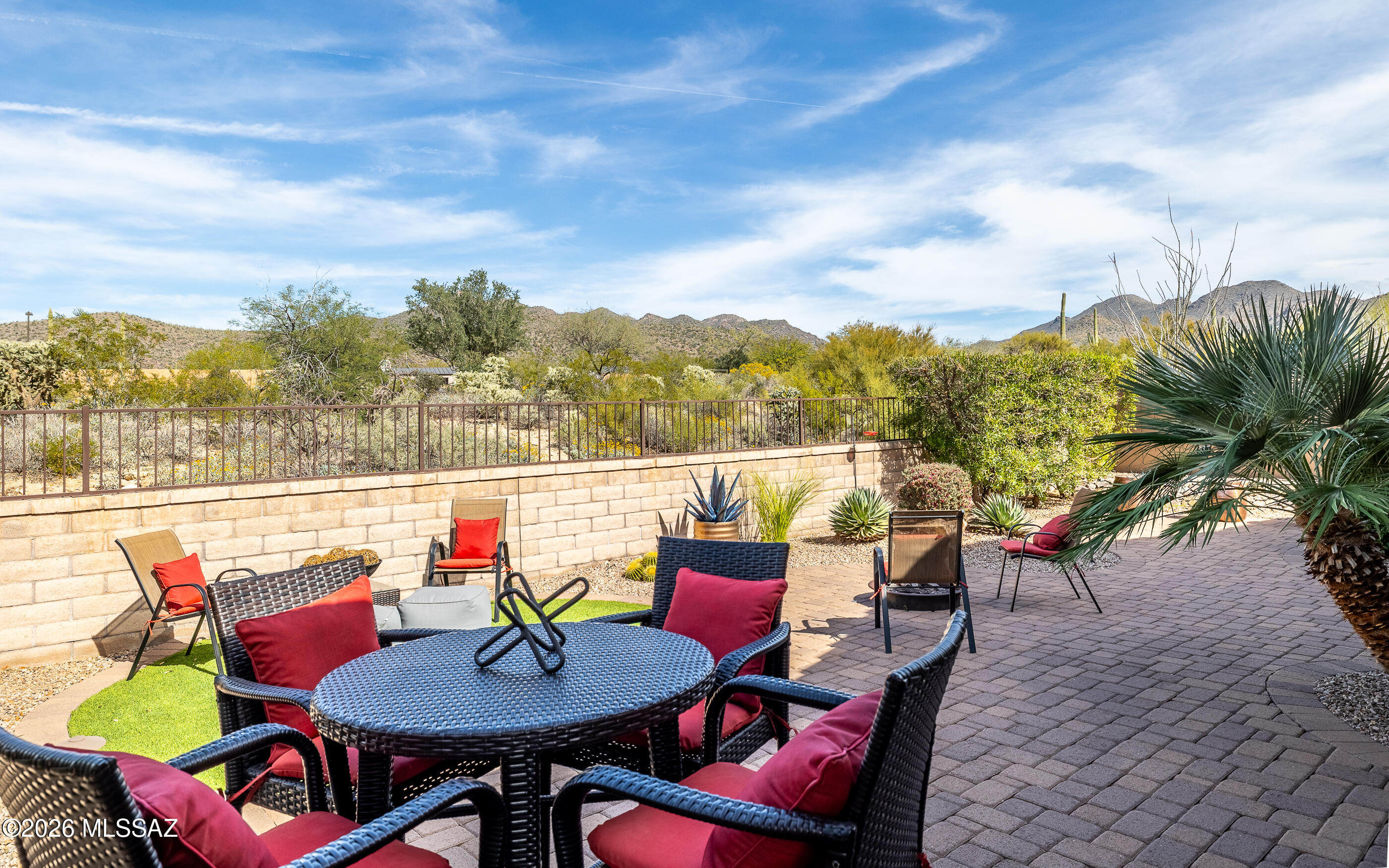 One of the most beautiful, tranquil, relaxing backyard/patio areas in Del Webb - with lovely Tortolita Mountain views. A peaceful oasis. Extended brick paved rear patio w/fire pit seating area + a gated front courtyard relaxation area.  Gorgeous interior - walls of glass w/two oversized sliding doors to back porch - from great room & dining room. Lovely kitchen w/rich granite, upgraded cabinets, stainless appliances - and a stylish custom pantry door. You'll love it when you see it! Highly favored Sanctuary model w/2 bedrooms + a den/office.  This home's contents - furnishings & accessories + kitchen & linens- are available on separate bill of sale- easily a turn-key property.  Immaculate condition and truly move-in-ready.  Quick close is possible. Call agent for turn-key pricing.