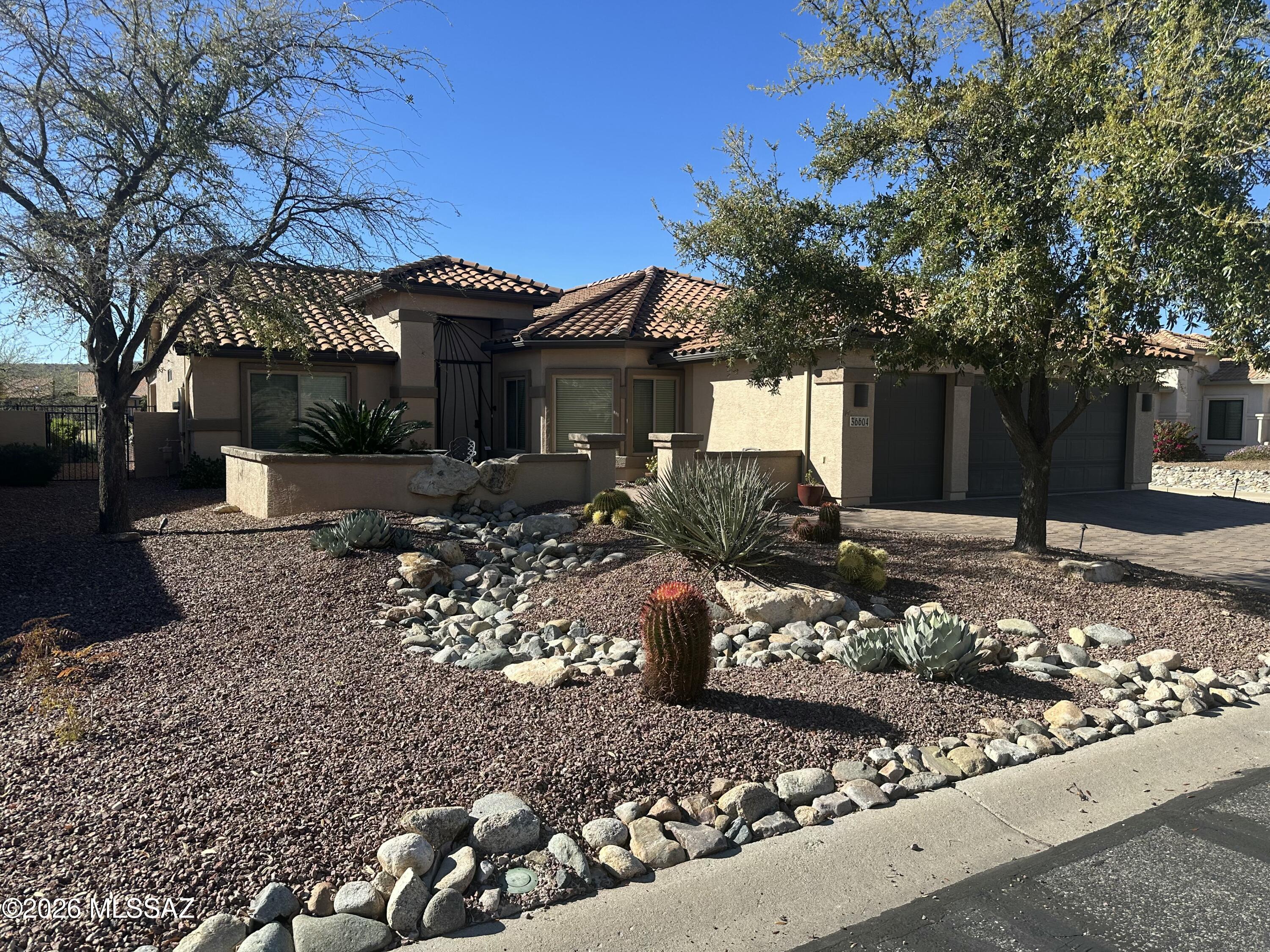 Golf Course Views in Saddlebrooke!
This open floorplan Laredo model features 2 bedrooms; 2 bathrooms; a den; a pool, and a golf cart garage!  The home is appointed with tasteful updates throughout including the kitchen, the bathrooms and the laundry. The roof underlayment was replaced in 2025 and a new HVAC system was installed in 2021. Take advantage of year round swimming in your solar heated pool while overlooking the golf course and enjoying all that Saddlebrooke has to offer.