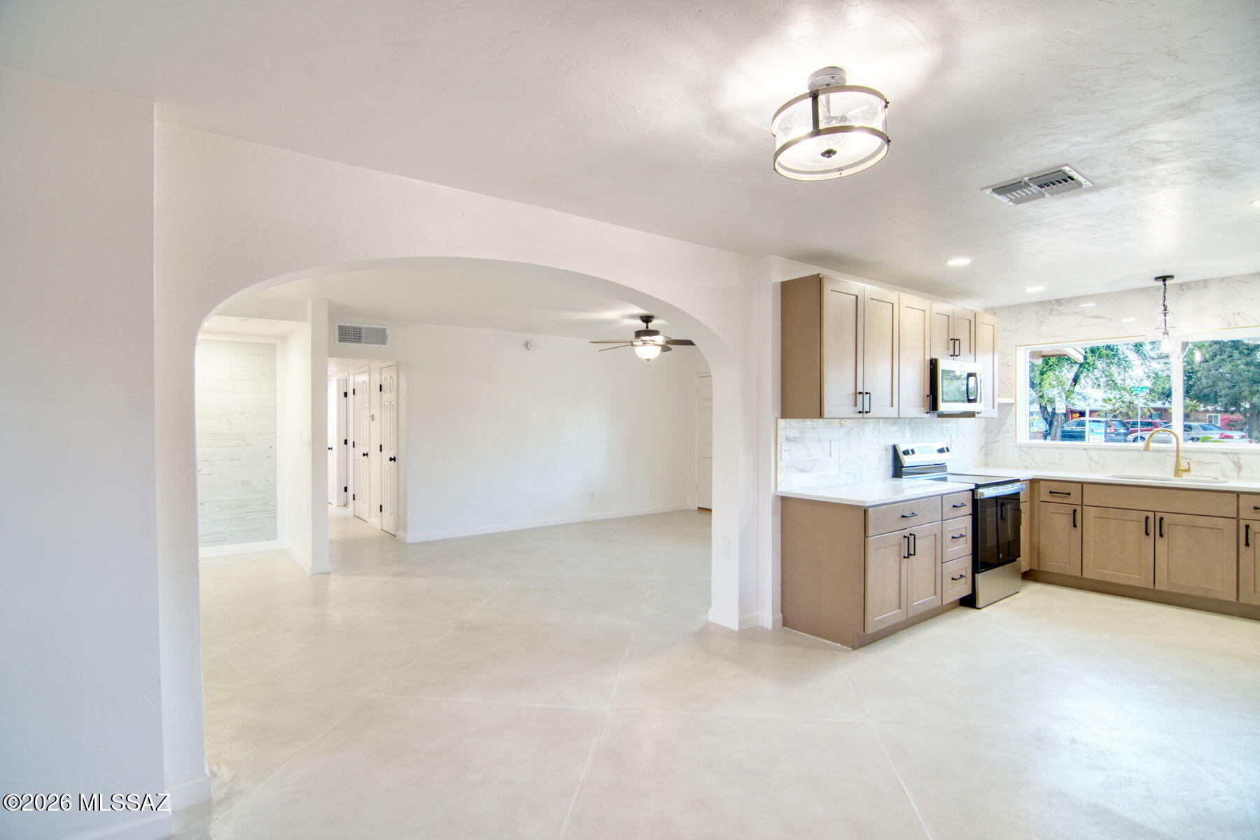 Range priced $375,000- $385,000! DO NOT MISS THIS ONE! This house is special! When you walk in the WOW EFFECT is full motion. Great central location, new kitchen, quartz counter tops, huge .21 acre lot concrete floors and so much more. This home is loaded with character and charm. It is all new but the character left in, a rare find. New HVAC, new windows, new shingles, new electric panel,  two storage/workshops, mature landscaping and the street is from a time warp somewhere around 1965. Owner/Agent