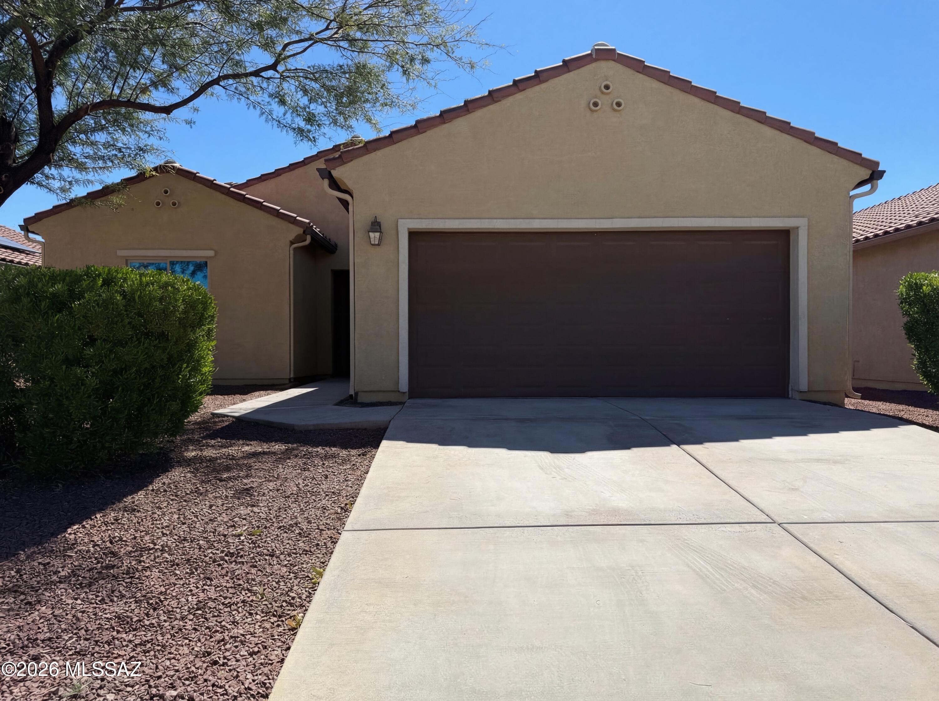 Welcome to your move-in ready suburban retreat in the growing community of Red Rock! This beautifully refreshed home offers the perfect blend of comfort, style, and everyday convenience.

Step inside to a bright and airy open-concept layout, enhanced by freshly painted interiors and new flooring that create a clean, modern feel throughout. Designed for both relaxing and entertaining, the seamless flow between living spaces makes this home as functional as it is inviting. Enjoy the benefits of solar panels such as improved energy efficiency and potential savings on utility costs.

Experience the best of suburban living with access to incredible community amenities, including parks, a resort-style pool, splash pad, skate park, and dog park- perfect for enjoying the outdoors year-round. Conveniently located with easy highway access, commuting is a breeze while still enjoying the peace and charm of a welcoming neighborhood.

Don't miss your chance to own a bright, stylish, move-in ready home in one of Red Rock's most desirable communities!