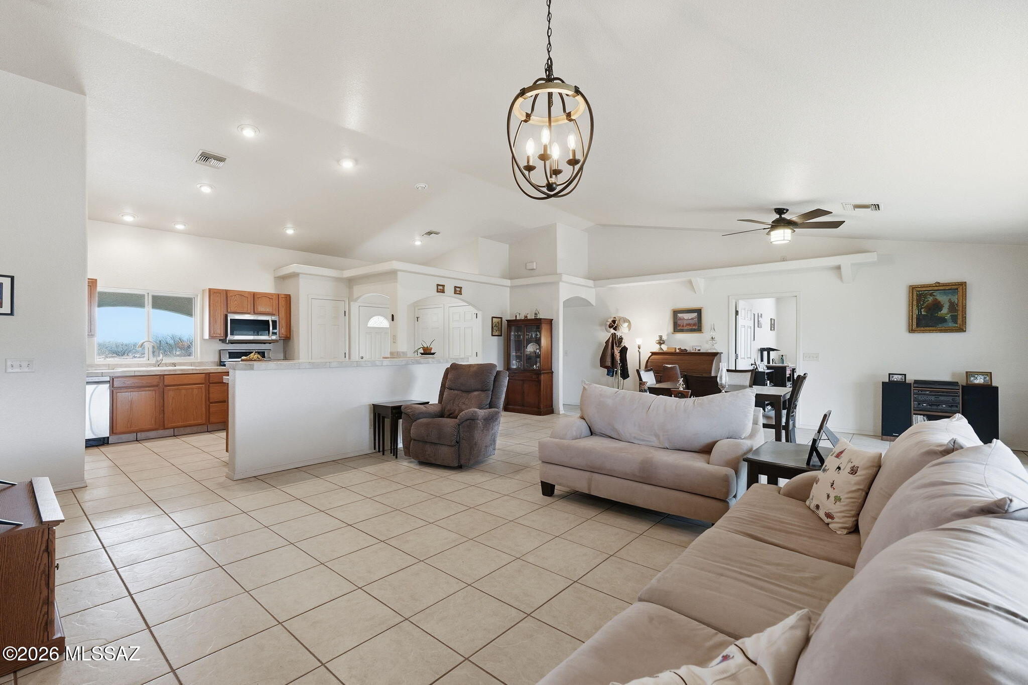 ustom-built 4 bedroom, 2 bath home with 2-car garage on 4.145 acres in the desirable southside Sierra Vista. Enjoy wide open spaces, privacy, and sweeping mountain views from this thoughtfully designed single-level home, offering plenty of room for RVs, toys, animals, or future outbuildings. Inside, the split-bedroom layout provides a comfortable primary suite on one side and three additional bedrooms on the other, ideal for family, guests, or a home office. The large acreage gives you the feel of rural living while still being a short drive to Sierra Vista's shopping, dining, and Fort Huachuca.