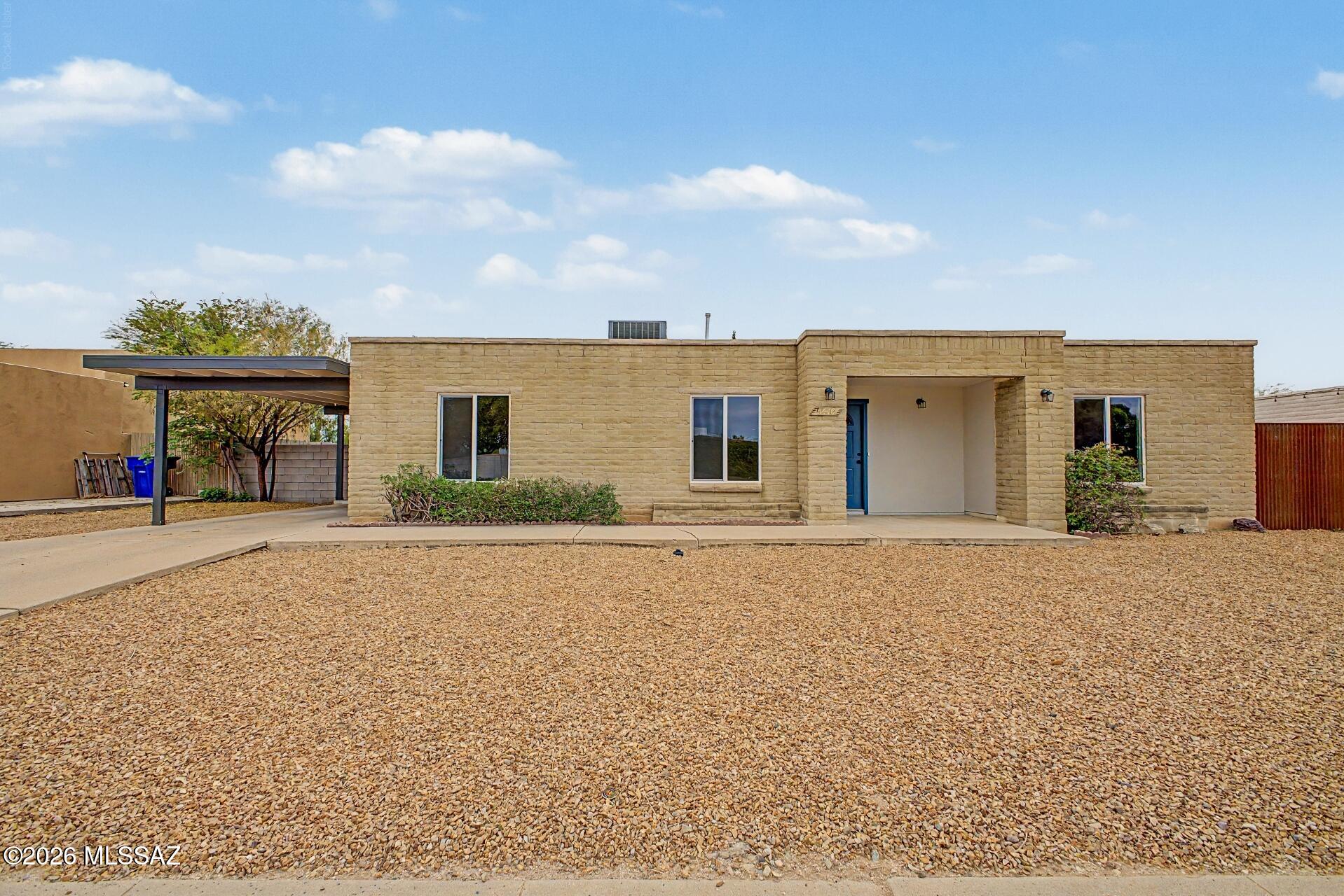 WOW!!! Beautifully renovated modern home with a private pool and HUGE backyard! Step inside to an open-concept floor plan featuring new wood-look flooring, modern finishes, a cozy fireplace and desirable split-bedroom layout. The open kitchen flows seamlessly into the living and dining areas and features stainless steel appliances, plenty of counter space and a great setup for entertaining. Step outside to your own backyard retreat with a sparkling pool, expansive yard, dedicated dog run and covered patio perfect for relaxing or entertaining. Plenty of outdoor space with endless possibilities! Modern, updated and move-in ready with an incredible indoor/outdoor lifestyle. This one is a MUST SEE!!!