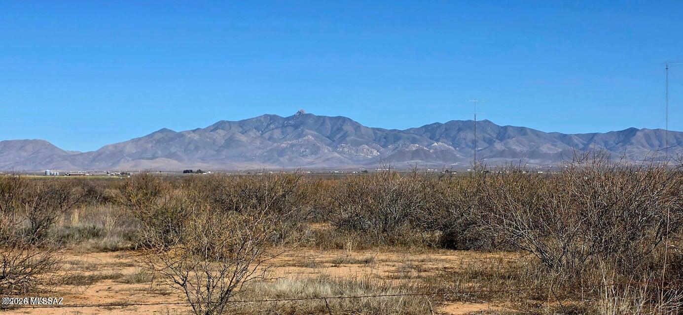 Just shy of 40 ACREs with power running along Chambers Road & Bear Track Trail and a private well.  The seller makes no guarantees regarding the condition of the well(s), and buyers to conduct their own inspections. The land is entirely level and ready for development. Located just two miles east of Kansas Settlement Road and two miles south of a proven grape-growing region, the property sits in Cochise County--an area gaining recognition for its boutique vineyards and wine industry. Willcox is only a short 15-20 minute drive, offering convenient access to services while still enjoying a quiet country lifestyle.  The old MFG home has NO VALUE.  There are (2) 40 AC parcels available & seller prefers to sell both together.  Possible terms but cash is also preferred.