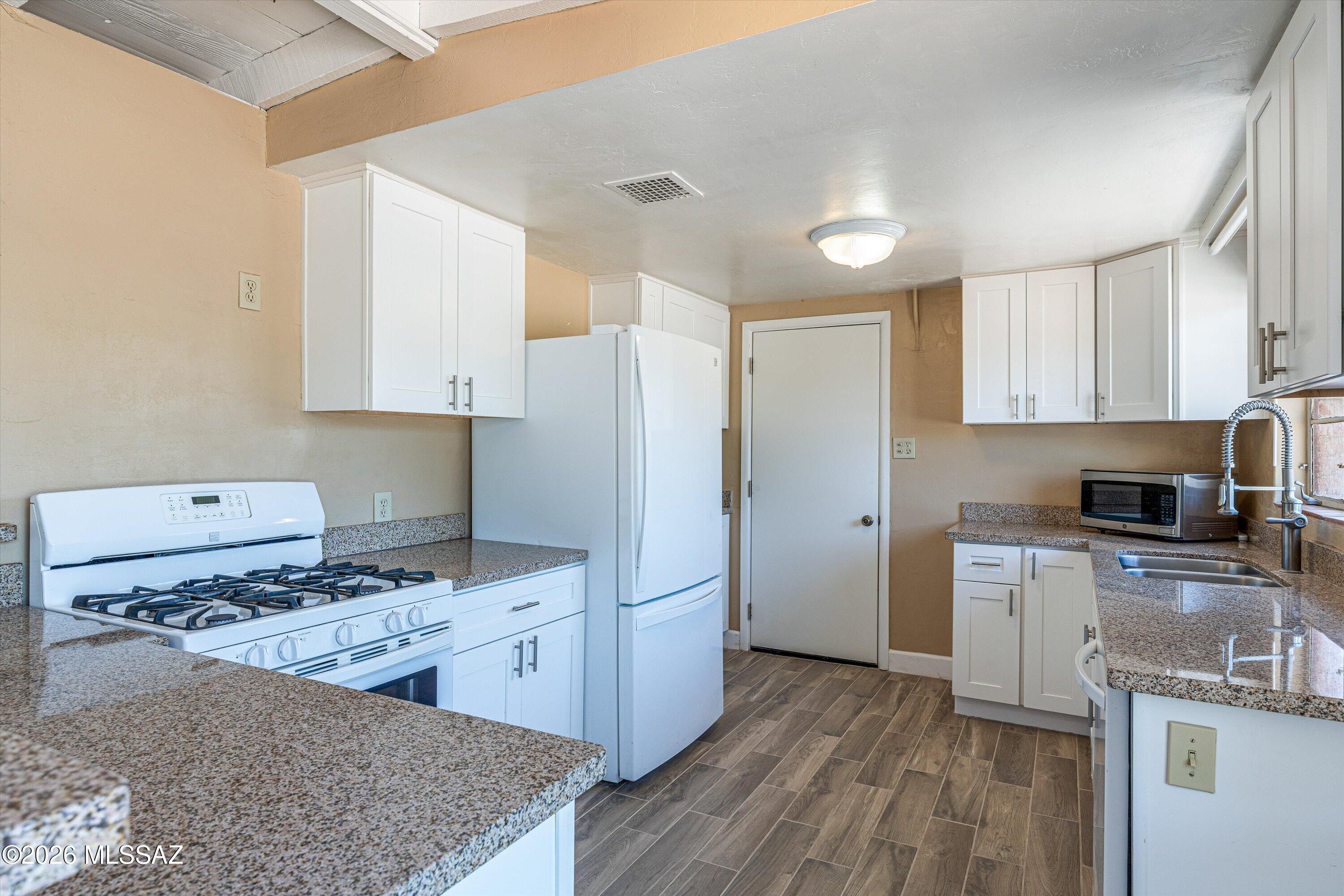 Positioned in the highly sought-after Blenman-Elm neighborhood, this property presents a compelling investment opportunity in one of Tucson's strongest rental corridors. Located just minutes from the University of Arizona, Banner -UMC, and downtown, the home is ideally suited for consistent student or medical professional rental demand.
This property is being offered individually or as part of an investor portfolio (7 homes total). 2050 N Campbell, 3434 E 5th, 3263 E 5th, 927 E 9th, 2619 E Helen & 2934 E Exeter. Please call for details.
Configured with five bedrooms and two bathrooms, the layout is well-suited for maximizing rental income, with one bedroom offering a private exterior entrance - ideal for added flexibility or separate leasing potential. The home features generous common areas design to accommodate shared living, enhancing its appeal for group tenants. Outdoor amenities further elevate the property's desirability, including multiple gathering spaces, a covered patio, and spacious courtyard. With strong proximity to major employment and education hubs, this location supports long-term appreciation and reliable occupancy.
Whether you're looking to expand a rental portfolio or secure a high-demand income property, this offering combines location, layout, and versatility for an exceptional investment opportunity.