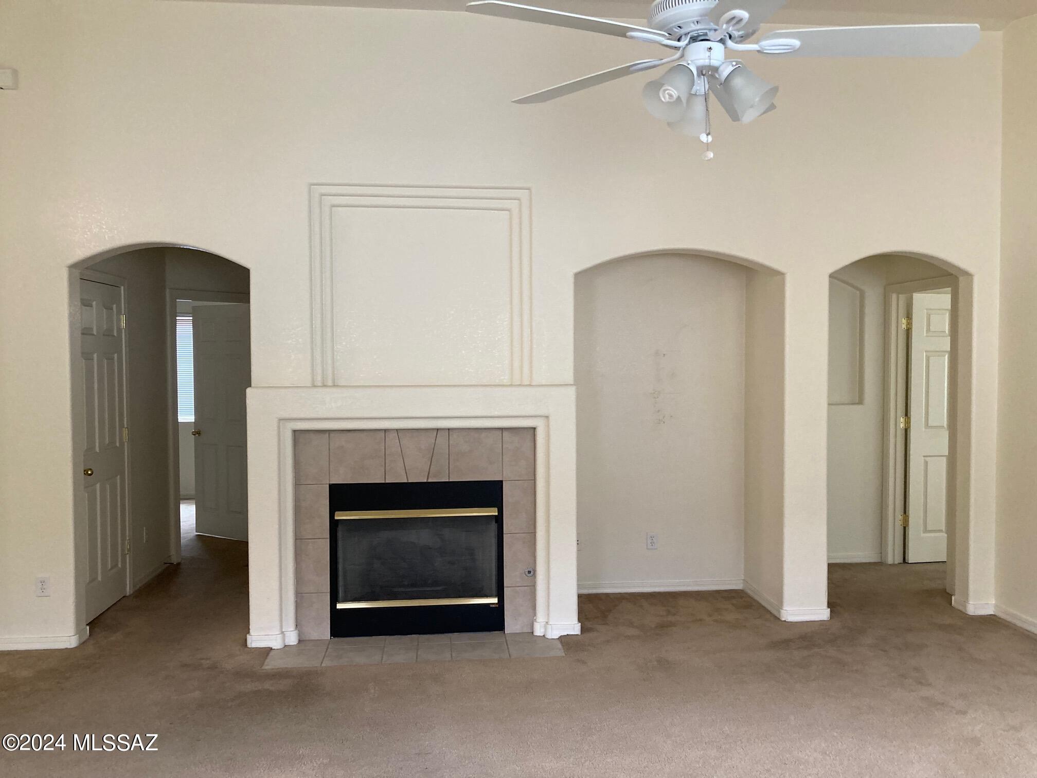 Call 520-906-7363 to view this home with spacious open floor plan with great room that includes fireplace.  Split 3 bedrooms and 2 baths, open kitchen dining area.  

Easy care yards, mountain views, 2 car garage.