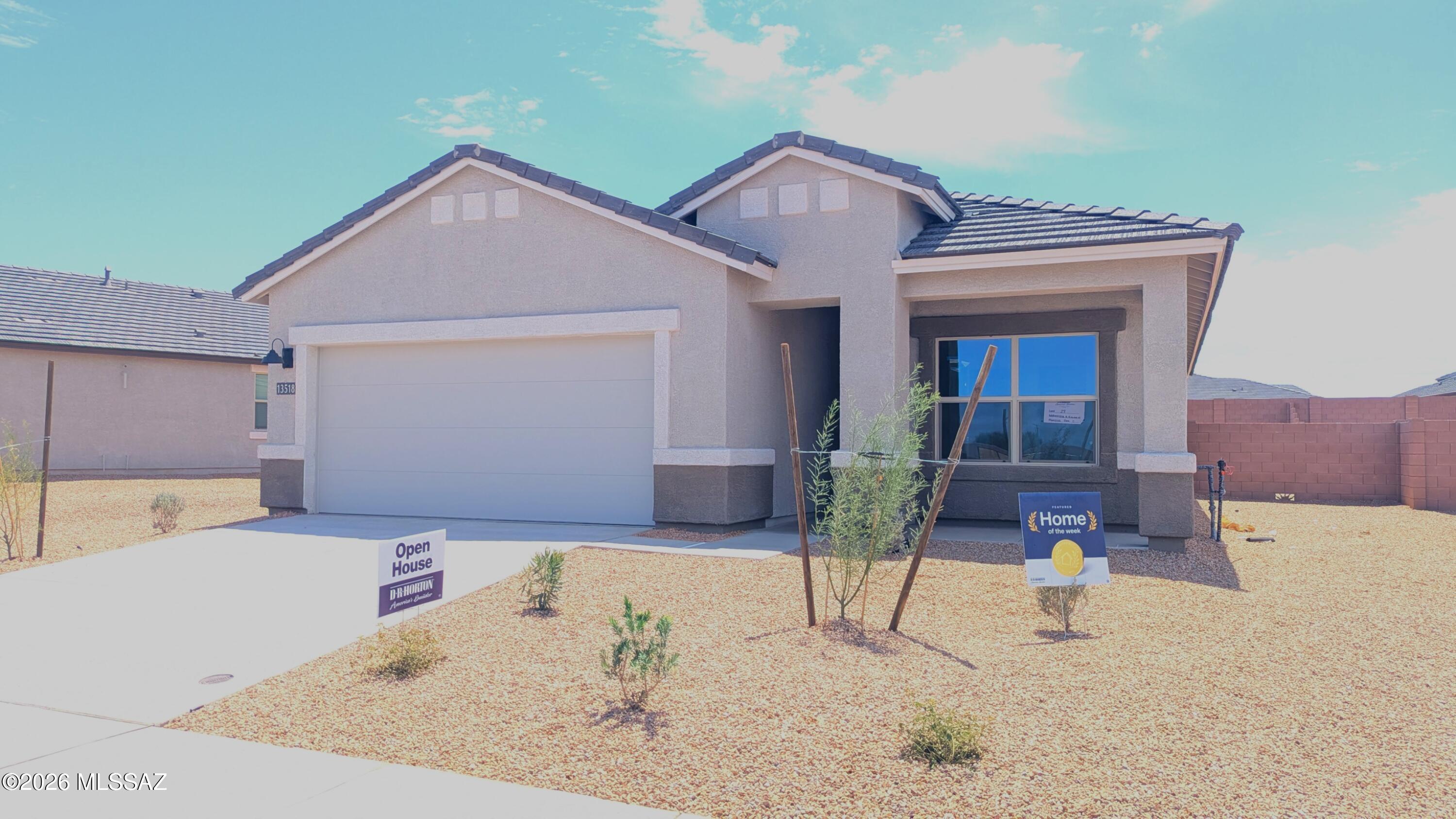 Move-in ready for July closing. Our popular Baxter plan is what you have been looking for. Talk about a huge homesite. Split plan gives the owner privacy while a comfortable great room allows for entertaining. Kitchen comes with 36'' Brown cabinets, light quartz and wood look LVP flooring. Installed DuPure® Ultra Filter Single Stage® Water Filtration and Rinnai® Tankless Water Heater. 9-foot Ceilings and many D.R. Horton Smart Home features! Neighborhood Walking Paths, Tot Lot with 1/2 BB Court, Ramada & BBQ Grill. You will not be disappointed. Come take a look.