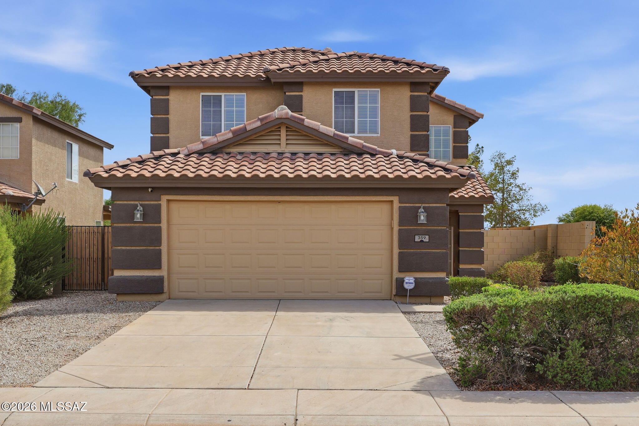 Clean, well maintained, and ready for immediate move-in. This 2,300 sq ft two-story home sits on a desirable corner lot and offers 4 bedrooms and 3 full baths, including a bedroom and full bath on the main level that serves equally well as a guest suite or home office. The open floor plan connects the kitchen, dining, and living areas with a breakfast bar and durable ceramic tile. Step out to a covered patio and private pool, a genuine asset through the Arizona summer. Upstairs, a spacious loft offers flexible second living space, plus a generous primary suite with a double sink vanity. Well suited to an owner-occupant or as a short-term rental. Coolidge offers a central Pinal County location with convenient access to the Phoenix and Tucson corridors.