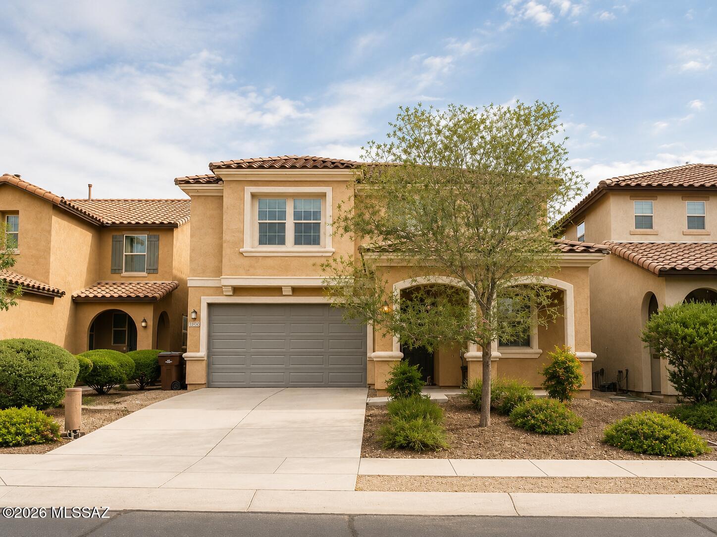 Welcome to this beautiful 5-bedroom, 2.5-bath home in the desirable Rancho Sahuarita community. Offering 2,836 square feet of well-designed living space, this home features a popular open-concept floor plan with a private den, versatile flex room, spacious loft, and an inviting great room that flows seamlessly into the gourmet kitchen. The kitchen is beautifully appointed with granite countertops, rich espresso cabinetry, a large pantry, and plenty of space for cooking and entertaining. Upstairs, the expansive loft provides endless possibilities as a media room, game room, home office, or additional living area. Each secondary bedroom includes a walk-in closet, providing exceptional storage throughout the home. Step outside to enjoy the covered patio and the privacy of the backyard, where you can relax and take in stunning Arizona sunset views. Adding even more value, this home includes a transferable SolarCity solar lease, helping to significantly reduce monthly energy costs while promoting energy-efficient living. Assumable VA loan.