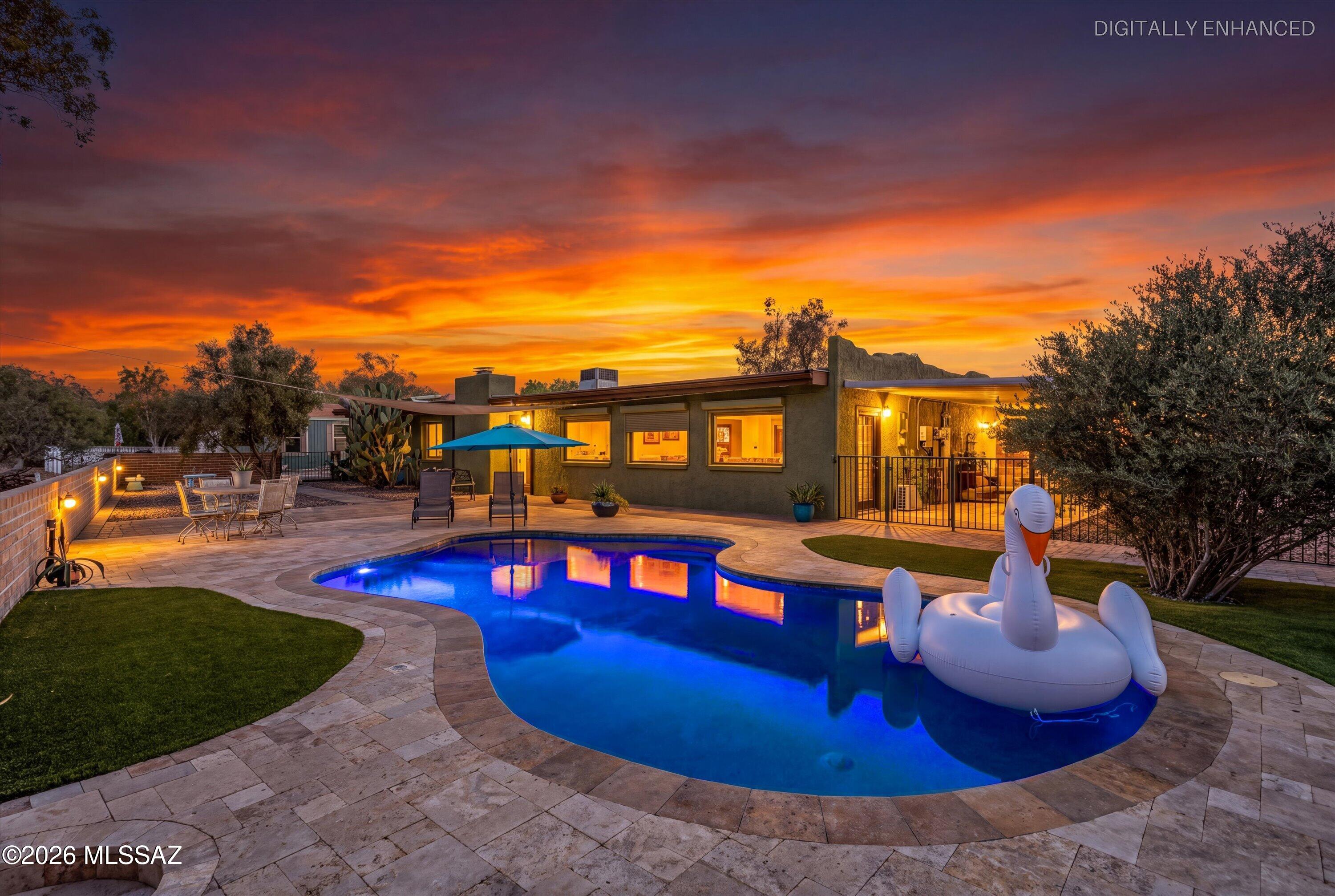 OVER AN ACRE OF LAND, OWNED SOLAR PANELS, SALTWATER POOL, NO HOA & A DETACHED GUEST HOUSE! From peaceful morning sunrises to beautiful evening sunsets, this expansive single-story property invites you to slow down, soak in the mountain views, and enjoy the Arizona lifestyle. A rare combination of space, comfort, and flexibility, this home welcomes you with beautiful curb appeal, generous parking, and room for your toys, hobbies, and future possibilities. Your own resort-style retreat awaits in the backyard, where a sparkling saltwater pool is surrounded by travertine with breathtaking mountains as the backdrop. Whether you're enjoying a quiet morning poolside or gathering with guests under the evening sky, this outdoor setting makes everyday living feel like a getaway.
Inside the main home, character and comfort come together with an updated kitchen, a welcoming family room with a fireplace and exposed wood ceilings, and a charming Arizona room featuring exposed brick and picture windows that bring the outdoors in. A versatile bonus room offers space for a playroom, home gym, or creative retreat, while bedroom mini-splits provide personalized comfort.
The detached casita features two bedrooms, one bathroom, a living area, and a kitchenette--offering flexibility for extended family, visiting guests, or potential rental use.
With over an acre to enjoy, no HOA, ample parking, and space to explore future expansion, this exceptional property offers the freedom to create the lifestyle you've been looking for. Mountain views, a private pool, single-story living, and a separate guest house--all in one remarkable place to call home.