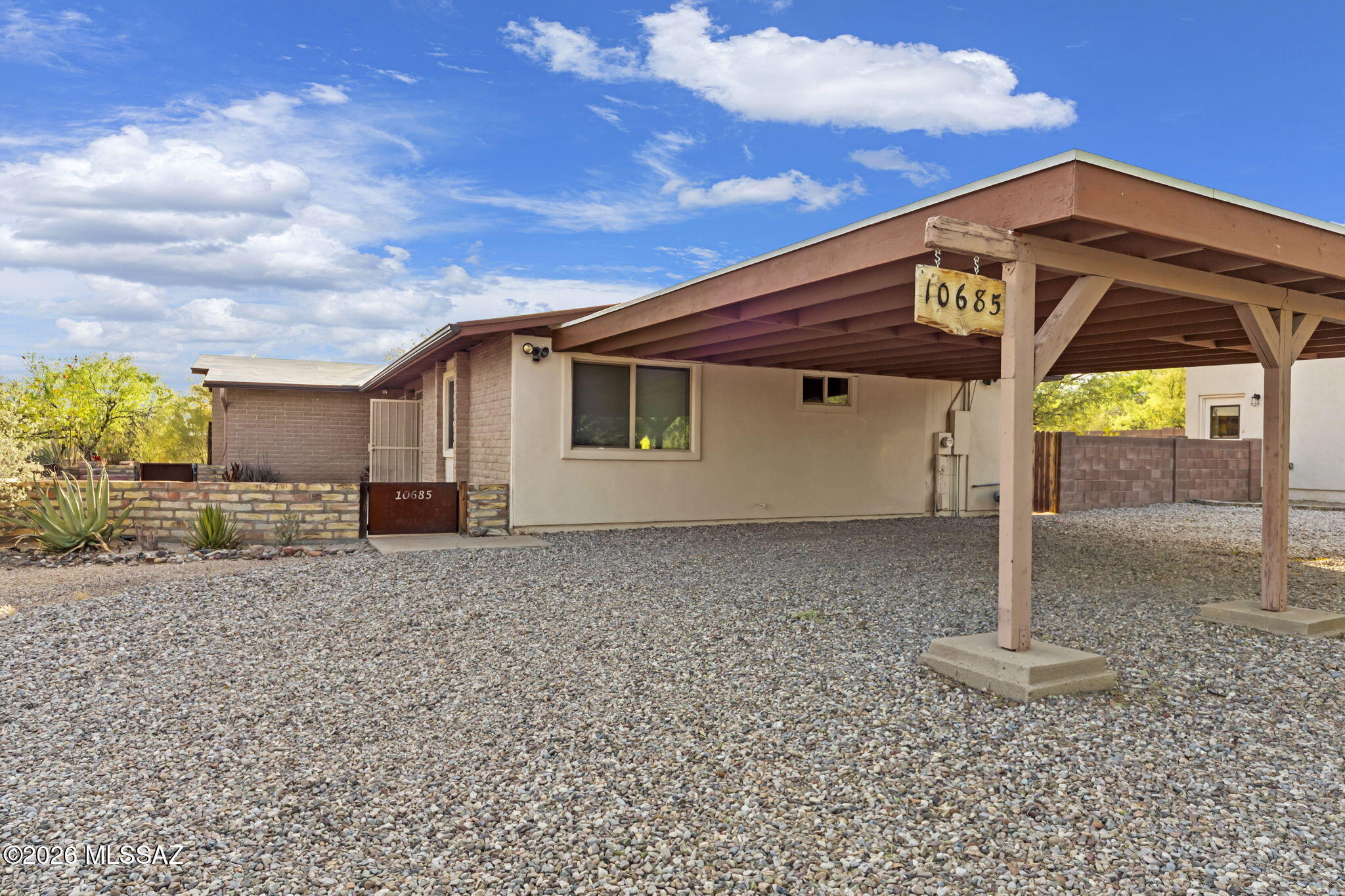 Homes with this much flexibility and usable space on over half an acre don't come around often. Set on a .62-acre lot with mountain views peeking through the property, this well-maintained 3-bedroom, 3-bath home offers the kind of versatility today's buyers are actively searching for.
Inside, you'll immediately notice the fresh, move-in ready feel with upgraded flooring, new baseboards, and crisp interior paint throughout. The layout is both functional and adaptable, featuring two primary suites--one with its own private entrance for, guests, or even a separate work-from-home setup.
Step outside and the value really opens up. In addition to the detached 2-car garage and covered carport, you'll find a fully powered workshop with AC--perfect for hobbies, projects, or extra workspace. Two additional storage sheds provide even more room for tools, equipment, or organization.
The expansive lot offers low-maintenance landscaping with plenty of space to create what you want--gardens, outdoor entertaining areas, or future additions. Whether you need room to spread out or simply want more privacy, this property delivers.
Located in a neighborhood that's great for walking and biking, with an easy drive to shopping, dining, and everyday conveniences, this home offers the perfect balance of space, function, and accessibility.
If you've been waiting for a property with flexibility, usable land, and true potential--this is one you'll want to see in person."