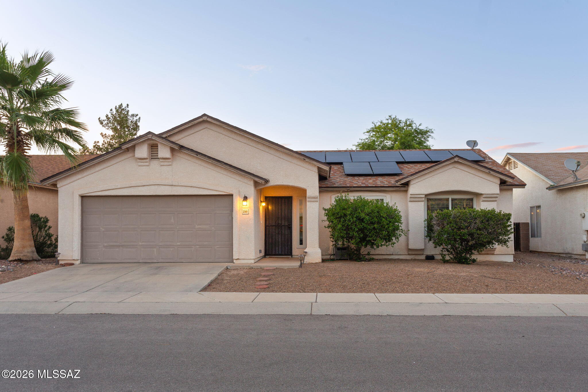 Welcome to this beautifully maintained Northwest Tucson home in the desirable Linda Vista Estates community. This move in ready 3 bedroom, 2 bath residence offers a bright and open floor plan designed for comfortable living and easy entertaining. The spacious kitchen features granite countertops, ample cabinet space, faux wood flooring, and a cozy breakfast nook. Natural light fills the living areas, creating a warm and inviting atmosphere throughout the home. The primary suite includes a walk-in closet and private en-suite bath, while the additional bedrooms offer flexibility for guests, a home office, or hobbies. Step outside to enjoy a large backyard with a covered patio, mature landscaping, and stunning mountain views perfect for relaxing or entertaining year-round.