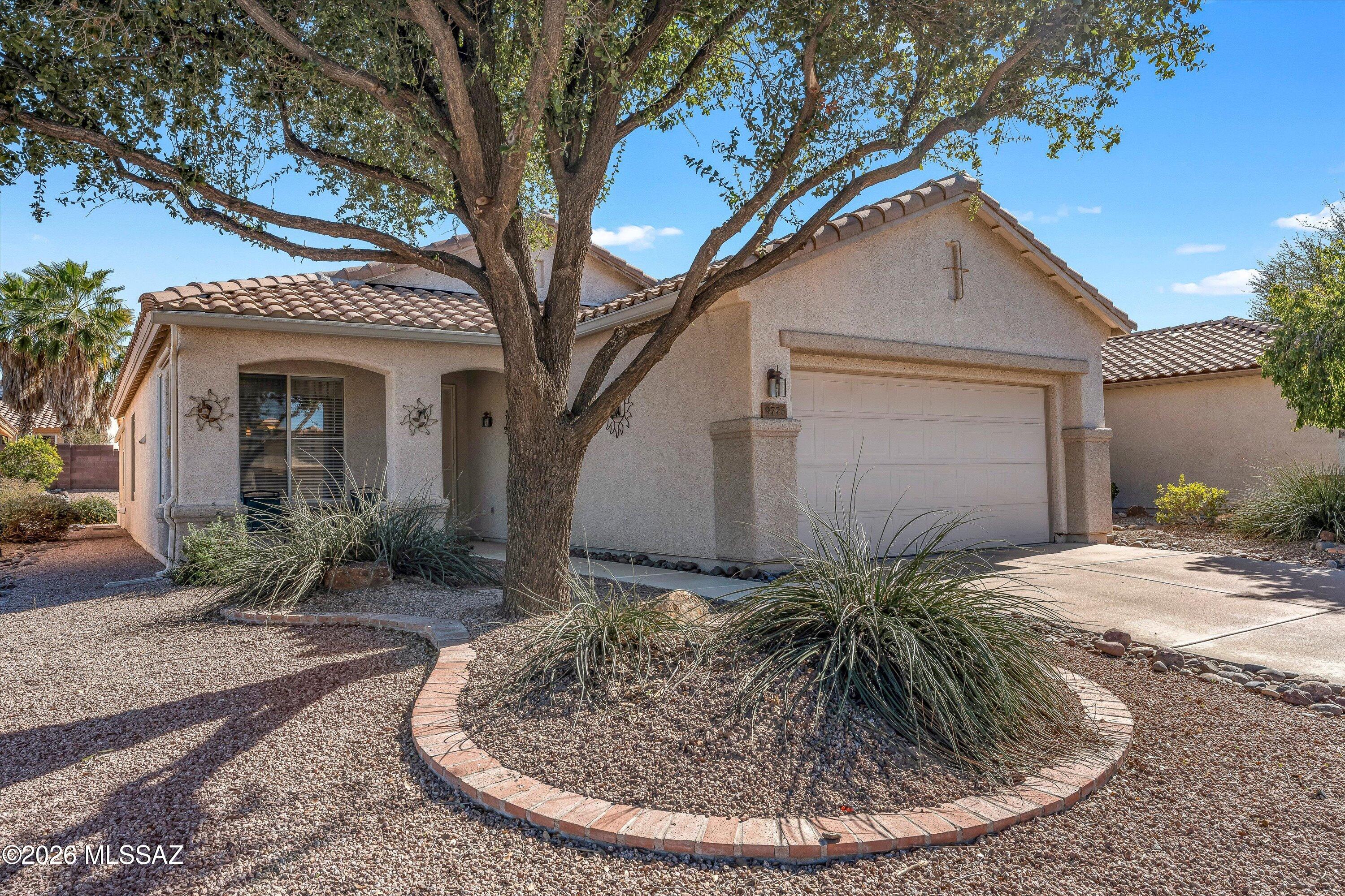 Located in the premier 55+ community of Sunflower in the North Tucson Mountain Foothills, this 1,312 sf Sierra Model is perfectly situated on a quiet cul-de-sac lot, offering privacy and low-traffic living. Designed for comfort and functionality, the home features 2 bedrooms, 2 baths, and a spacious Great Room with an additional area ideal for formal or casual dining. Kitchen is replete with a pantry, bkfst nook & bkfst bar. An extra room is currently used as an expanded pantry space with a second refrigerator. Roof underlayment was replaced in January 2025, providing added peace of mind. The primary suite offers two closets & a private ensuite w/bath with a generously sized walk-in shower. Step outside to a spacious screened-in back patio, perfect for enjoying Tucson's beautiful evenings.