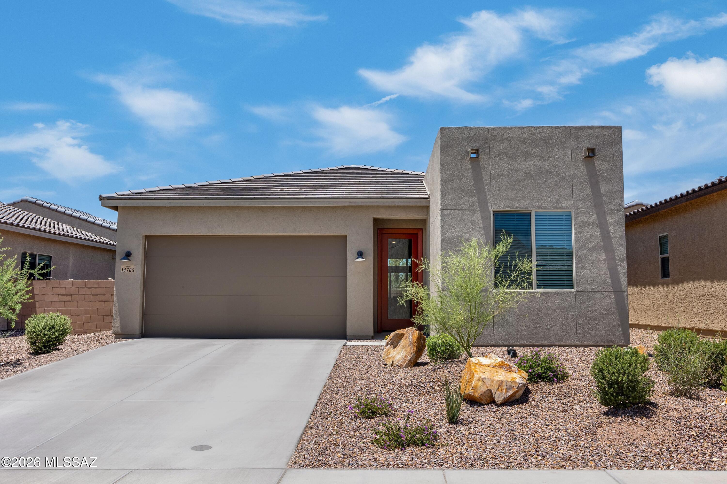 Experience the best of Dove Mountain living in this ''better than new'' single-level residence with over $10K in upgrades since purchase! With 4 bedrooms plus a versatile den, this thoughtfully planned home provides the perfect balance of comfort, flexibility & modern living.

The open floor plan seamlessly connects the kitchen, dining & living areas, creating an inviting environment for both everyday living & entertaining. The great room opens to a beautifully landscaped backyard retreat featuring no rear neighbors & breathtaking sunset views.

The split-bedroom layout provides a private retreat for owners & guests alike, while the flexible den offers endless possibilities for a home office, hobby space or additional living area. Enjoy the benefits of a nearly new home without the wait, featuring contemporary finishes, energy-efficient construction, and a low-maintenance lifestyle. Easy access to hiking, biking, parks and more. Furniture available on separate bill of sale for turn-key option!