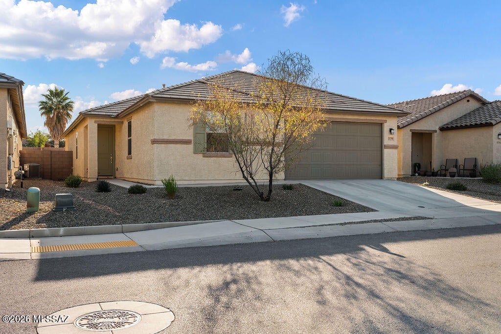 UP TO $10,000 SELLER CONSESSIONS with an acceptable offer! Tucson Home Tour Winner!! This home blends modern style, thoughtful design, and everyday convenience just minutes from Davis-Monthan Air Force Base, Tucson International Airport, shopping and dining at Park Place Mall, and easy access to I-10. Inside an open-concept floorplan that flows beautifully, offering 3 bedrooms, 2 baths, plus a dedicated multi-media room complete with projector and screen that convey. Artistic paint and design touches add personality throughout, while sleek quartz countertops in the kitchen and all bathrooms elevate the finishes. The primary suite features a stunning tiled shower, and wood-like plank tile runs throughout the main living areas for both style and durability. Enjoy peace of mind with major components only five years old, a soft water system already in place, and low-care front and backyard landscaping. The private backyard retreat includes a hot tub--perfect for relaxing under the Arizona sky.
