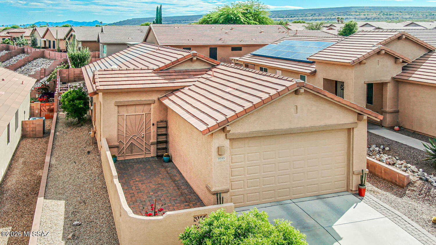 Beautiful Las Campanas Home, Open Floor Plan, 2 Bedrooms, 2 Baths, Den and a Large 2 Car Garage. The Kitchen has been Upgraded (Cook/Bakers Dream Kitchen), Custom Cabinets, Electric Cooktop, Wall Oven, Microwave, Tile Floors, Ceiling Fans, Solar Tube, Laundry Tub and many more great features. Screened in Back Patio with very little yard to take care of (Very Private). This is one to see!!!