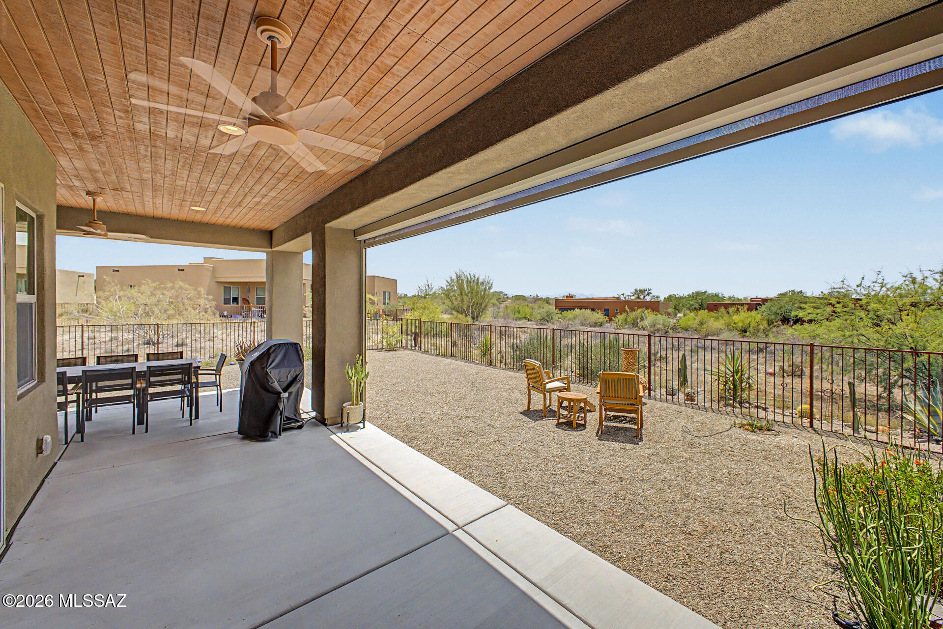 Welcome to the 55+ community of Academy Village! This beautiful 2023 built home features a split floor plan of 3 bedrooms and 2 full bathrooms, open concept living and kitchen areas, and beautifully designed, low maintenance landscaping! 8026 S Galileo features custom window coverings throughout and a powered sun shade on the covered back patio. The backyard is a true oasis- features a large covered area for dining and lounging, landscaped with low maintenance natural desert plants, and is fully fenced in. Split floor plan gives a very large primary bedroom, and on the opposite side of the home is a private second bedroom which is great for guests. Turn bedroom three into your dream office or hobby space!
