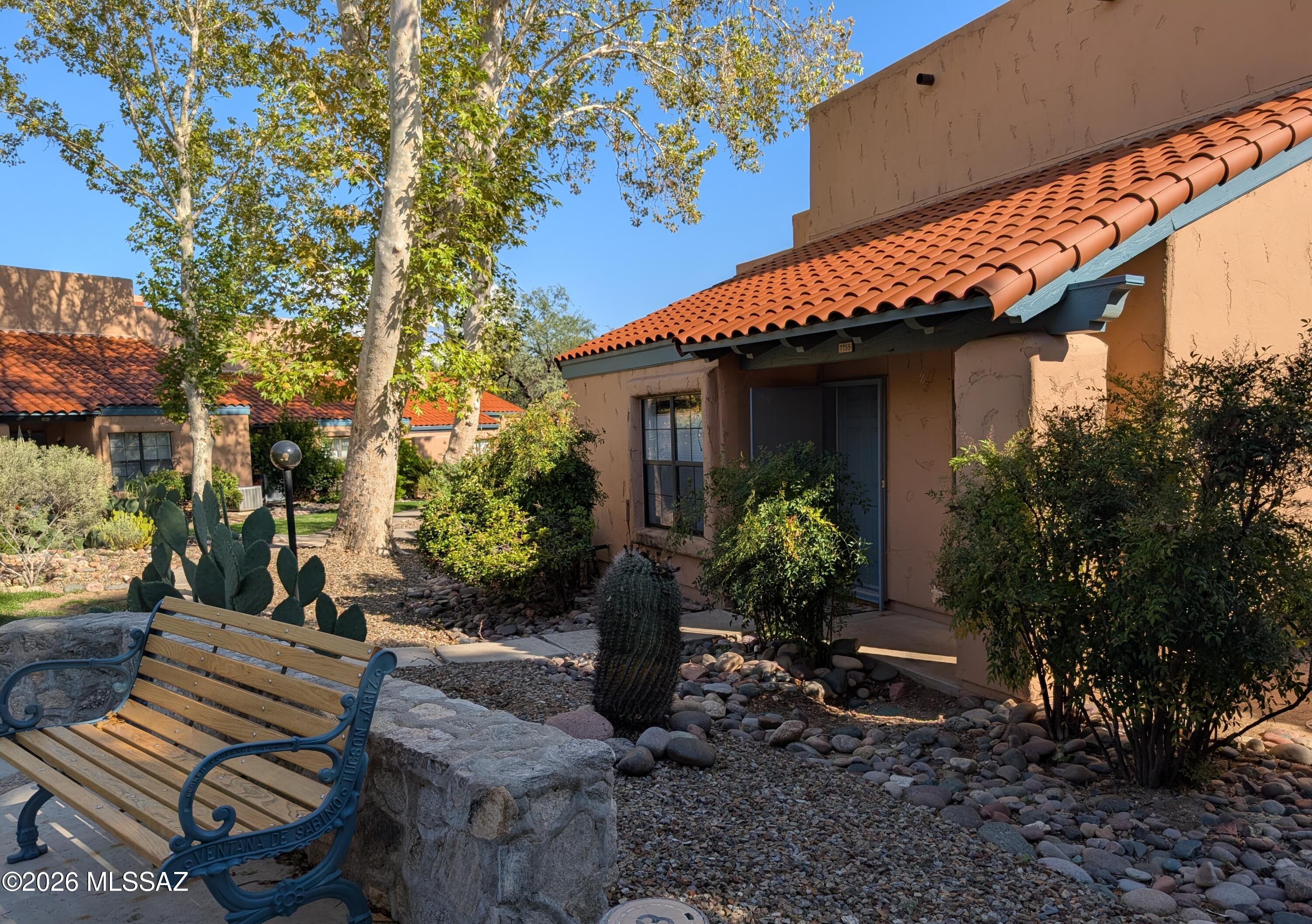 Resort style living in prime location near Sabino Canyon. Single story. End unit. Ceramic tile floors. Levelor blinds throughout. Soaring ceilings and semi-open floorplan create a spacious feel.  Private patio with storage closet.   Enjoy the community pool, BBQ and tennis courts. Great dining choices and hiking trails nearby.