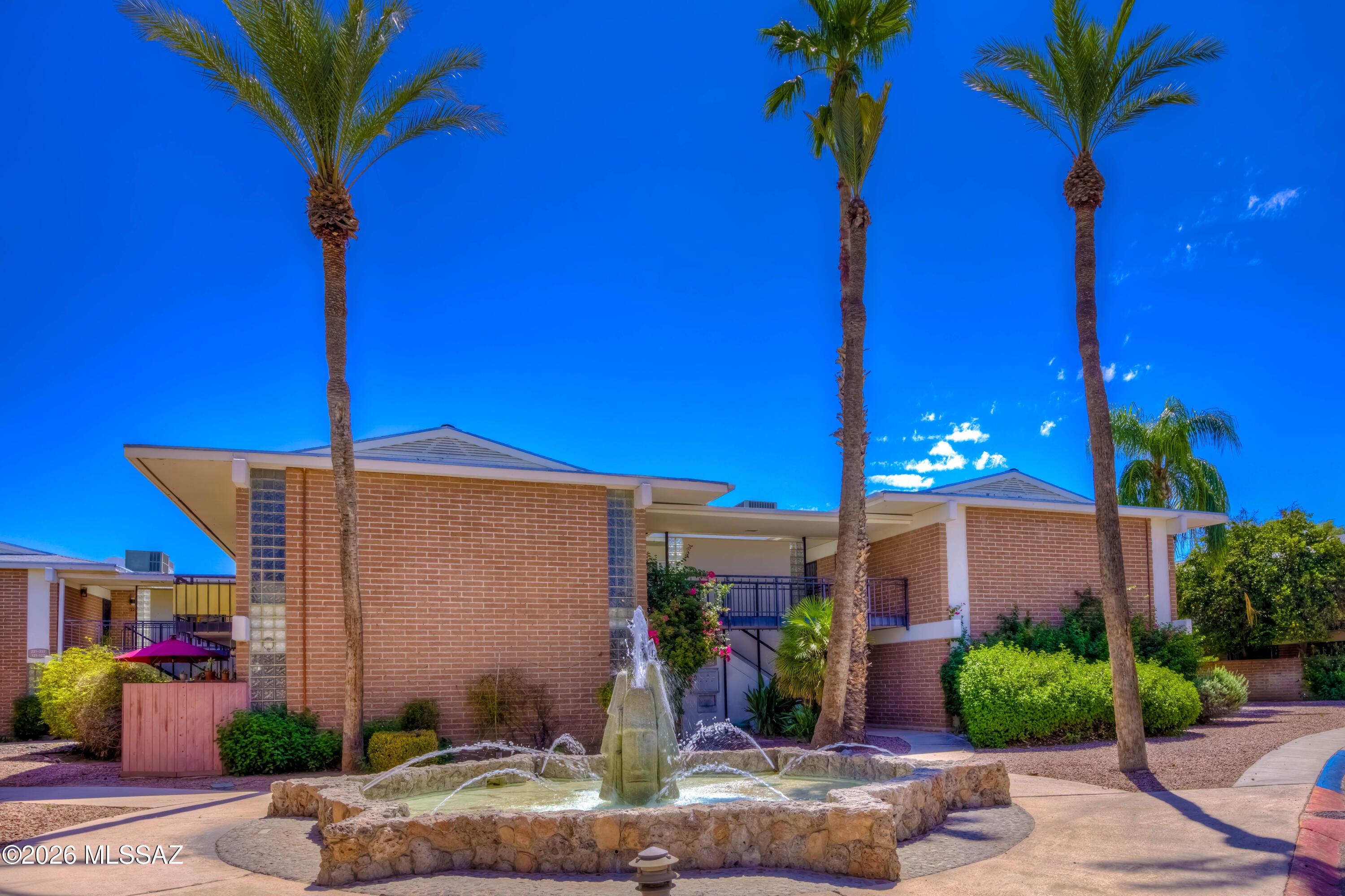 Exceptional opportunity in the centrally located Eden Roc community, just minutes from the University of Arizona, Downtown Tucson, and the vibrant Sunshine Mile dining and shopping district. Situated directly across from Reid Park, this spacious mid-century condo offers one of the community's largest floor plans and unparalleled access to some of Tucson's most beloved amenities, including the golf course and driving range, pickleball courts, walking and biking trails, the lake, the Reid Park Zoo, and the Reffkin Tennis Center. Timrod Street is a designated bicycle route, providing easy connectivity to Tucson's extensive cycling network. Short term rentals allowed, giving you ultimate flexibility.