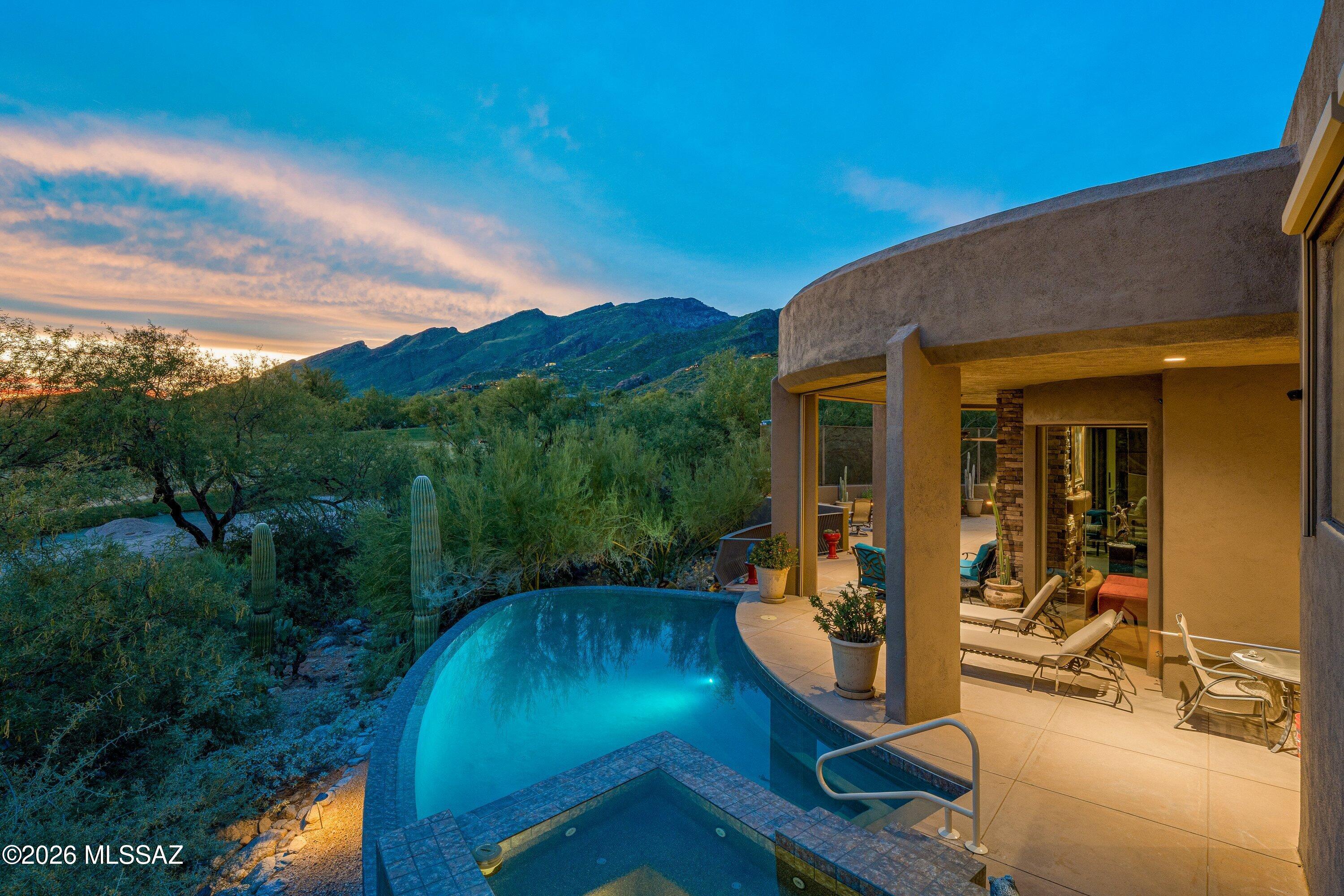 Set against the beauty of the Catalina Mountains and overlooking the golf course, this spacious Ventana Canyon residence offers an exceptional setting in one of Tucson's premier communities. With approximately 4,650 sq. ft., the home features three bedrooms plus a private office, generous living and entertaining spaces, and an abundance of storage throughout.

The well-appointed kitchen features Dacor appliances, a gas cooktop, ample cabinetry and plenty of space for gathering. Expansive windows bring in natural light while capturing the surrounding mountain, desert and golf course views. A dedicated workshop provides valuable additional space for projects, hobbies and storage. Outdoor living is a highlight, with a private pool and spa creating an inviting setting for relaxing or entertaining while enjoying the surrounding Sonoran Desert landscape.

Ideally located near Sabino Canyon with convenient access to hiking and biking trails, shopping, dining and everyday amenities. With its spacious floor plan, exceptional storage, workshop, golf course setting and beautiful views, this home offers a wonderful opportunity to enjoy all that Ventana Canyon has to offer.