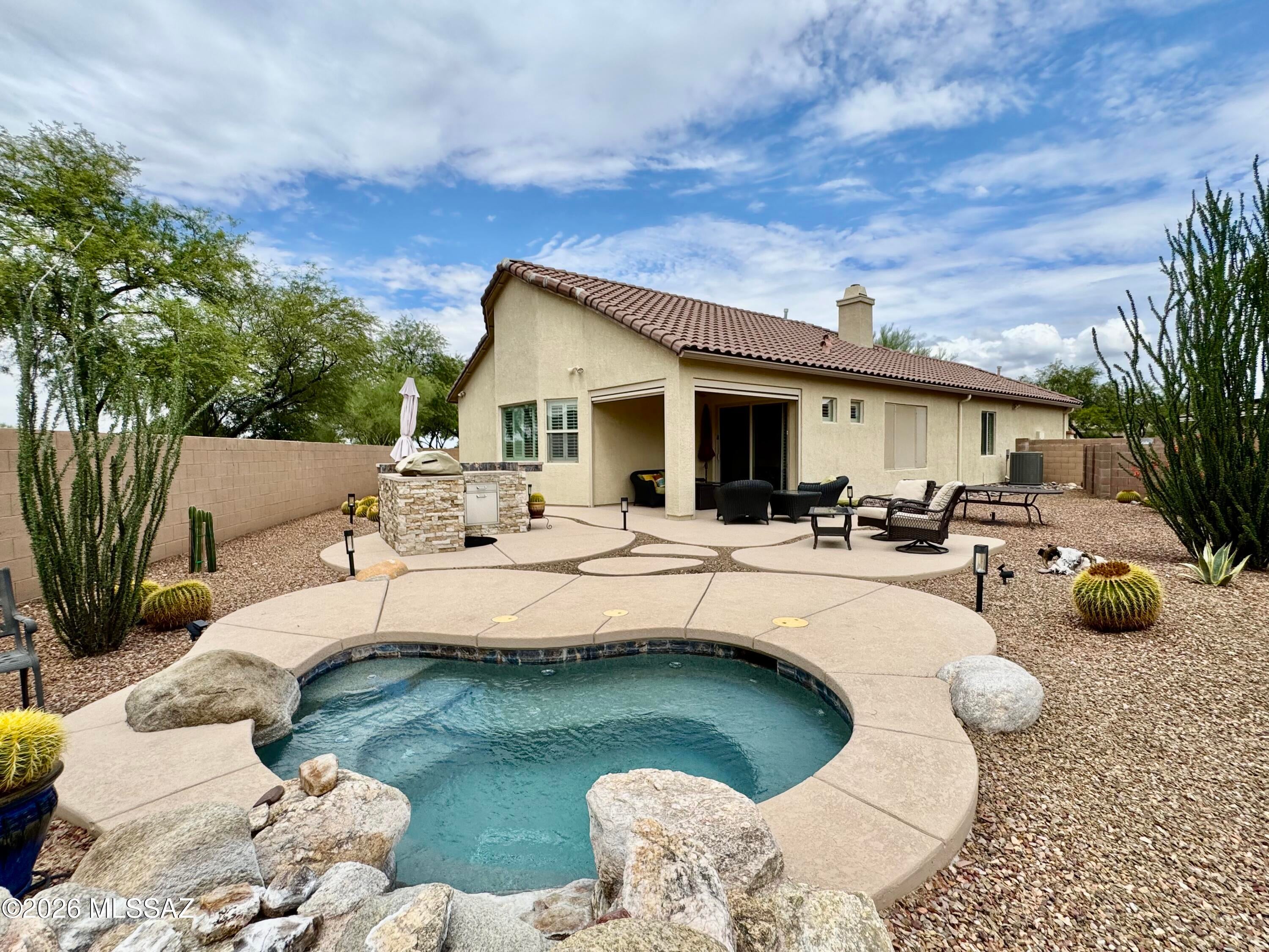 FULLY FURNISHED!!! Posted rate is based on a 12 month lease. Please inquire for stays shorter than 12 months as rates are based on availability, length of stay, & season. A minimum 30-night stay is required. 

Enjoy comfortable Oro Valley living in this spacious three-bedroom, two-bath home with a large den or office and beautiful Santa Catalina Mountain views. The private backyard is ideal for relaxing or entertaining, featuring a heated spa/spool, built-in gas BBQ, bar seating, generous patio space, and motorized sunshades. Additional highlights include updated appliances, a newer HVAC system, a remodeled primary shower, water softener, and upgraded garage features.