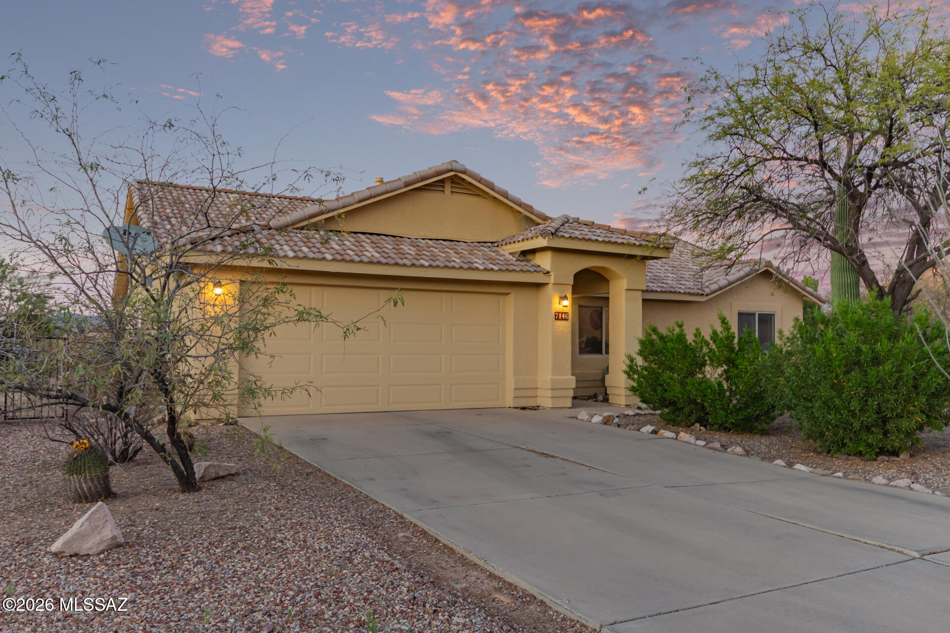 Nestled on a spacious nearly 0.84-acre lot at the end of a quiet cul-de-sac, this beautifully updated 3-bedroom, 2-bath home offers privacy, space and stunning Tucson Mountain views. Thoughtfully renovated throughout, the home features updated flooring, remodeled bathrooms and a beautifully remodeled kitchen offering quartz countertops, stainless steel appliances, ample cabinetry and generous counter space, making it perfect for both daily living and entertaining! The renovated bathrooms also feature quartz countertops, adding a modern and cohesive feel throughout the home, while the updated flooring flows beautifully from room to room. Major system updates include a newer HVAC system installed in 2020 and a water heater replaced in 2022, providing added comfort and peace of mind. Outside, the expansive backyard and covered patio offer endless possibilities for relaxing, entertaining or enjoying the peaceful desert surroundings and breathtaking mountain views. The large lot provides plenty of space for outdoor living, gardening, or creating your ideal backyard oasis.