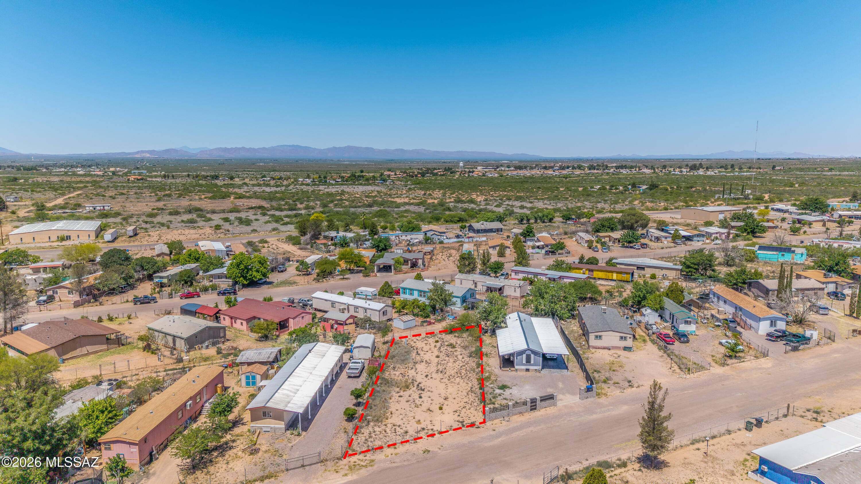 Opportunity to own a well-located vacant lot in the established Bay Acres subdivision in Douglas, Arizona. This 0.171-acre
(approximately 7,469 sq ft) parcel offers an ideal setting for a future home or investment property. Zoned MH-72, the lot allows for manufactured or sitebuilt residential use, providing flexibility for development. Situated in a growing residential area with nearby homes, utilities appear to be in the area (buyer
to verify availability, distance, and connection requirements). Conveniently located near E 27th St and N Iris Ave with access to local amenities, schools,
and shopping. This is one of the few lots in the area that is NOT located within a flood zone, offering added value and peace of mind for future
development.