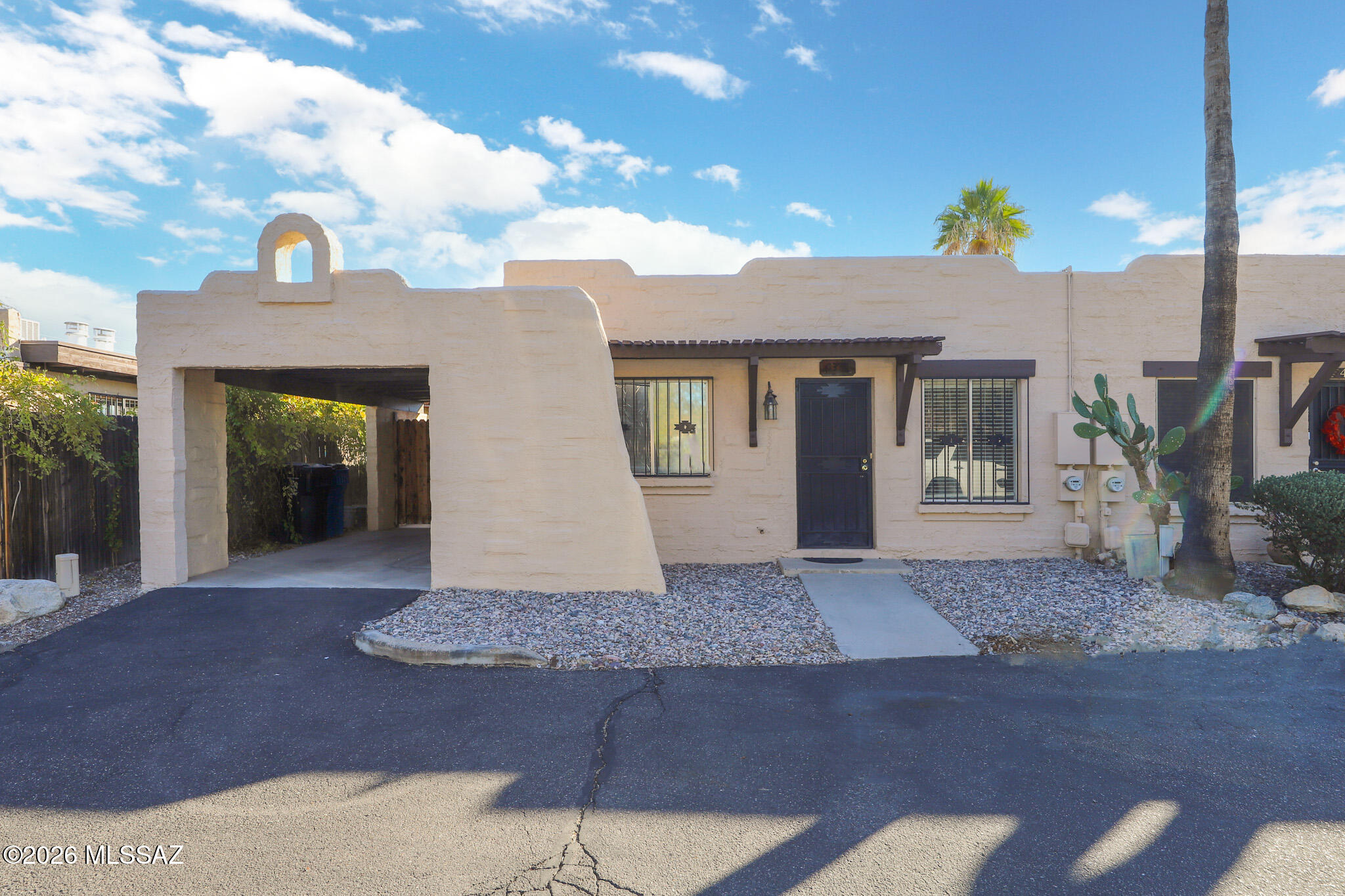 Situated on a Premium and Private lot in the Casitas Del Valle II community, this charming, move-in ready home offers a clean slate. Natural light welcomes you inside to the freshly cleaned interior. The great room is ready to host gatherings with friends/family or cozy evenings by the fireplace and a good book. Kitchen boasts ample cabinet and counter space as well as a large pantry. Space for an island if you so desire. Sparkling ceramic tile flooring throughout, NO CARPET! Home features two spacious bedrooms, both with ceiling fans and a sliding glass entrance to the back patio from the primary bedroom. Separate storage AND linen closets in hallway. Generous sized backyard with concrete patio has so much potential, even for a garden! Community pool for your enjoyment, don't miss out! *HOA includes water, sewer, trash and common area landscaping, street maintenance and community pool upkeep. Recent Reroof completed by Pride Construction and comes with a 5 year warranty. New exterior paint including all stucco and all wood (fascia, trim, pergola and gutters) as well as, the interior of carport.