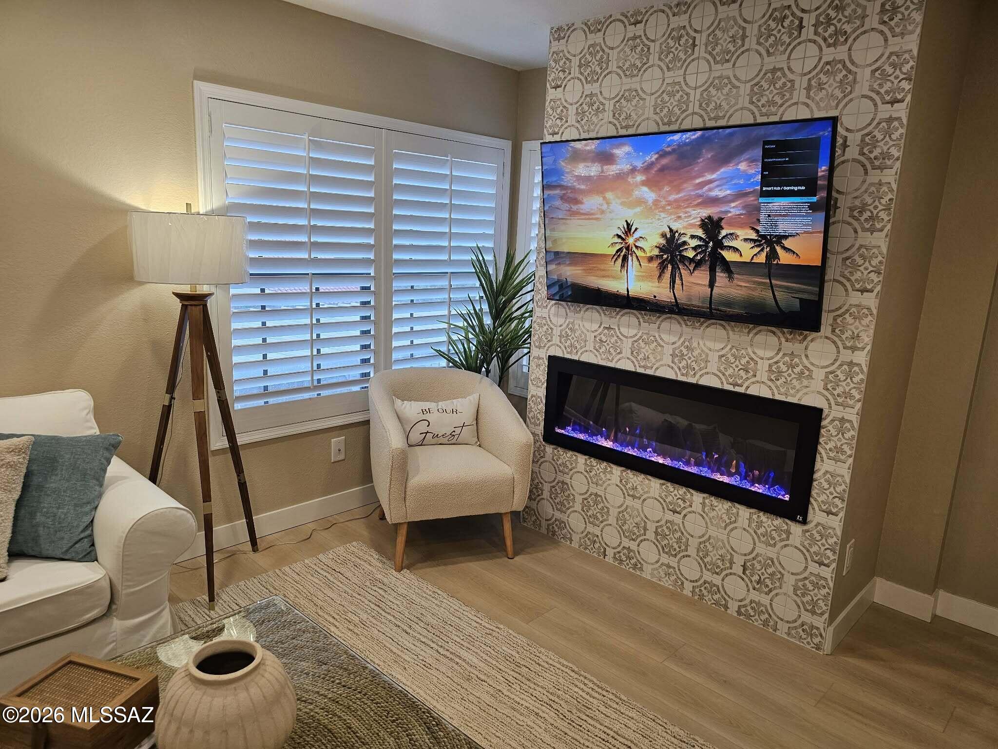 Seller will accept or counter offers between $240,000 and $260,000. Come see this completely reimagined luxury condo with a true designer renovation. Features include quartz kitchen counters, porcelain backsplash, & new Cafe appliances. Living area is anchored by a floor-to-ceiling tiled fireplace w/ electric insert & a dining area w/ built-in soft close floating buffet cabinets. Wood look wide-plank flooring runs throughout. Bedroom features brand new custom built-ins w/ beverage fridge & coffee bar. Additional upgrades include plantation shutters, 30 new LED lights, newer HVAC / water heater, and more. THIS MUST SEE CONDO HAS TOO MANY UPGRADES TO LIST! Furniture available via a separate bill of sale. Come see the best, turnkey, lock-and-leave condo Catalina Foothills has to offer!