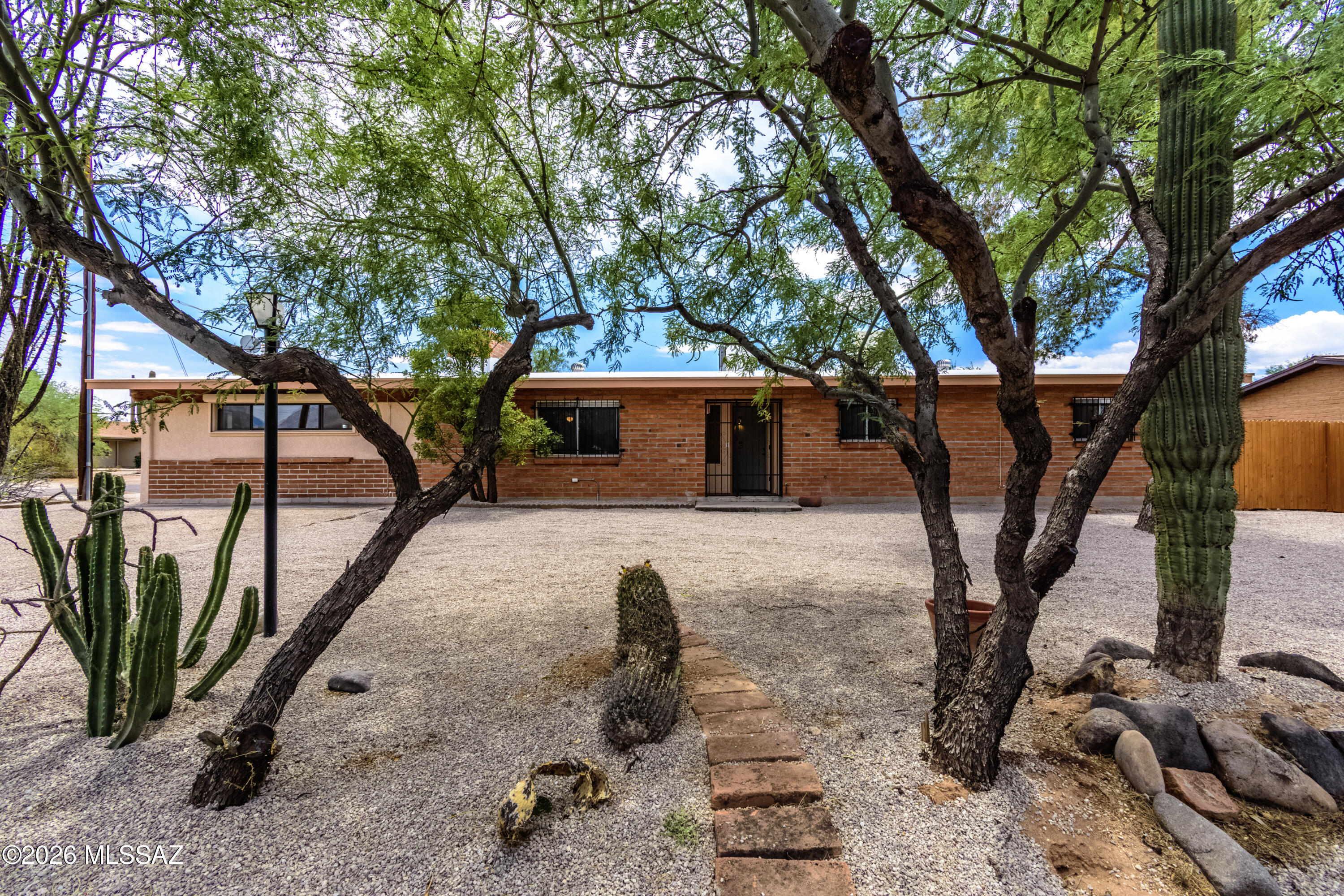 Welcome to this expansive 2,050sq ft brick home offering a rare combo of space function & modern updates conveniently located in central Tucson.
Home features multiple living areas including oversized great room w/ 2nd fireplace, ideal - entertain relax or create custom living setup. Open layout provides endless possibility for flex living work-from-home or hobby area.
Updated with modern wood-look lux vinyl plank floors, fresh finishes & clean, cohesive feel. The remodeled kitchen offers updated cabinetry, contemporary countertops, and a practical layout brings it all together.
Finished Garage & bonus flex room ad even more versatility. Back yard exudes privacy and awaits your personal touch.