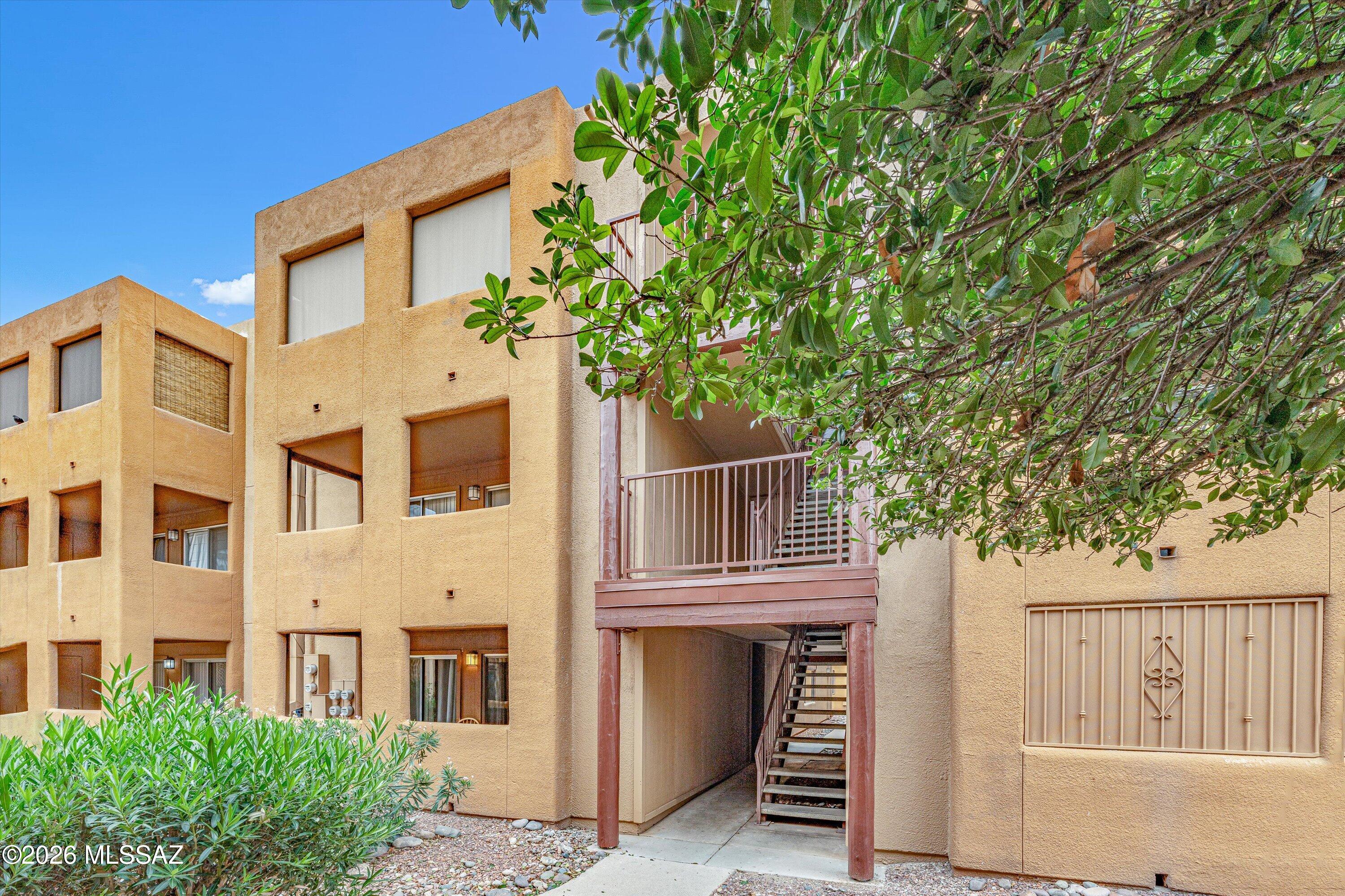 COMPLETELY REMODELED & TURN KEY! 1-bedroom, 1-bath condo conveniently located in central Tucson. Situated on the third floor, this move-in-ready home features attractive wood-look flooring, fresh neutral finishes, and abundant natural light. The updated kitchen offers quartz-style countertops, rich wood cabinetry, and stainless-steel appliances. The bathroom features a beautifully remodeled walk-in shower with modern tilework. Enjoy Arizona living from the covered private balcony with mountain views, plus additional storage for added convenience. A fantastic opportunity for a primary residence, seasonal getaway, or investment property, with easy access to the University of Arizona, Banner Medical Center, shopping, Buyer to perform due diligence on HOA fees and Assessments