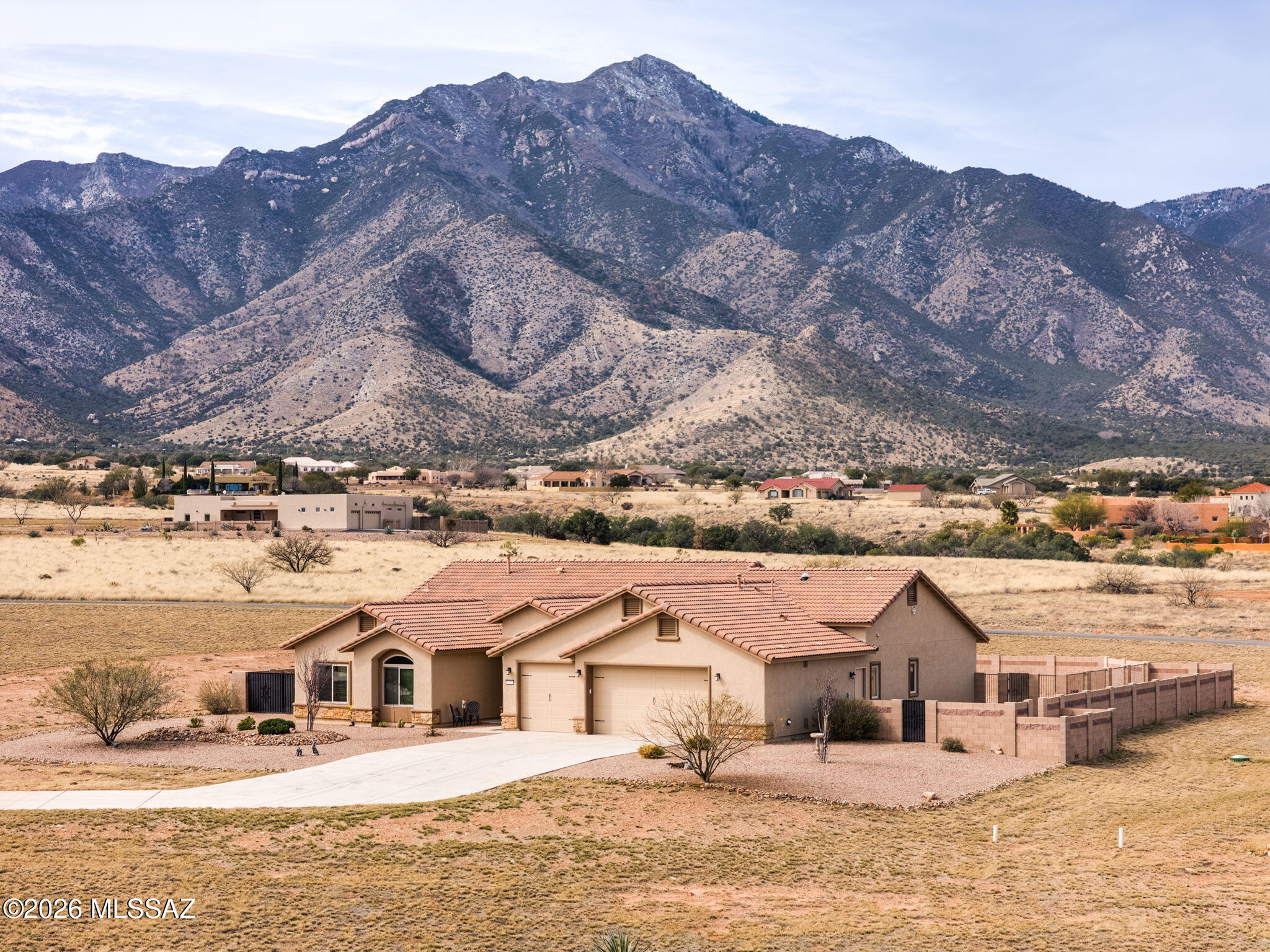 Set behind the gates of the prestigious Wild Horse community, this refined 4-bedroom, 2.5-bath residence offers approximately 3,040 sq ft of elegant living space framed by majestic mountain views.

From the moment you enter, custom lighted architectural niches and a dramatic fireplace create a warm yet sophisticated atmosphere. The gourmet kitchen is designed to impress, featuring generous prep space and seamless flow into expansive living and dining areas - ideal for intimate gatherings and large-scale entertaining.

Thoughtfully appointed with built-in surround sound, patio heaters, and an expansive primary suite - the home delivers an elevated living experience throughout. The oversized 3-car garage provides abundant space for vehicles, storage, and recreational needs.
