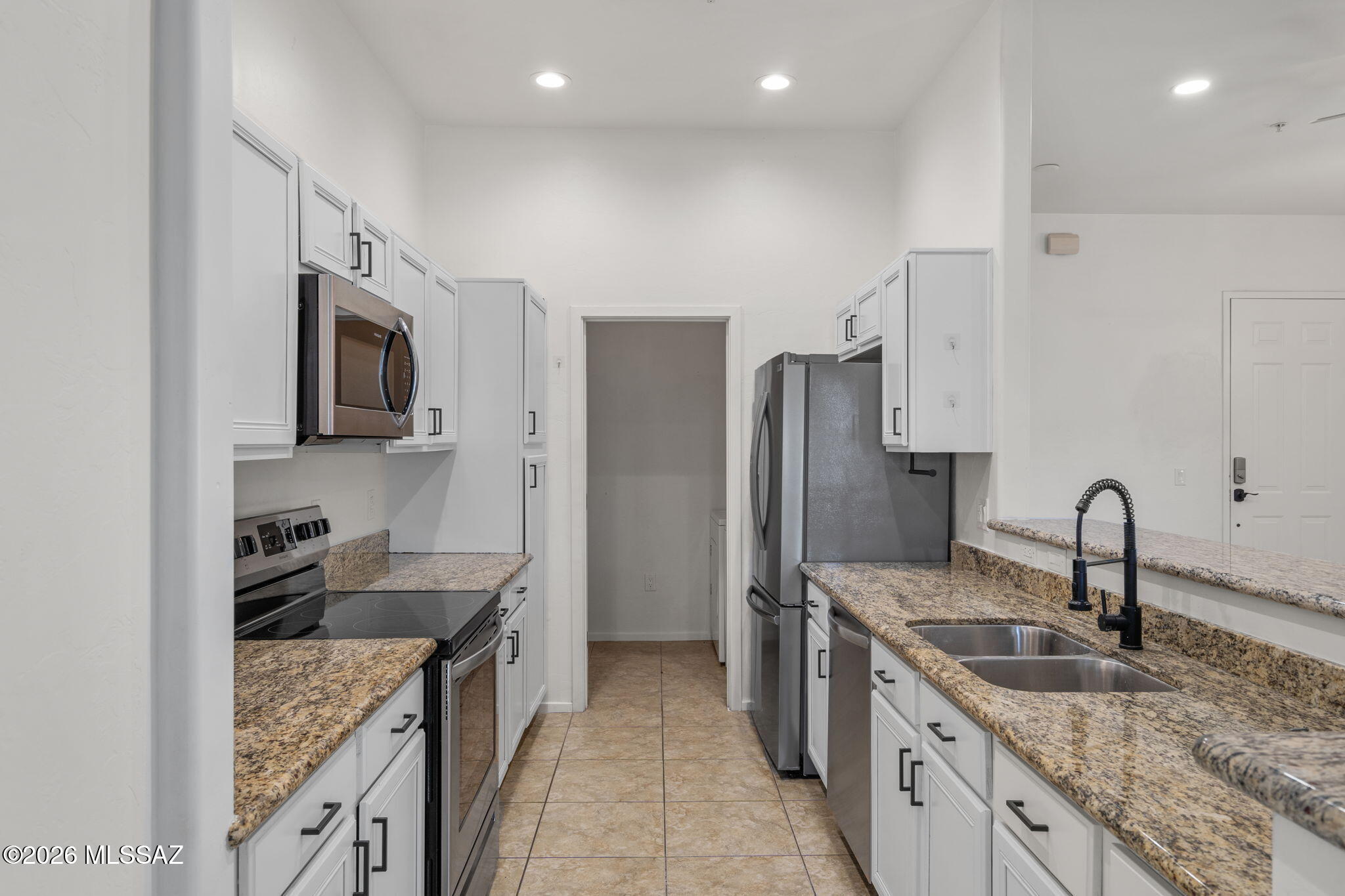 Live where the city meets the trails! This modern Placita Escondida condo offers the best of Tucson living. Walk directly from your gated community onto The Loop for miles of biking, rolling and running or stroll over to St. Philips Plaza for weekend farmers markets and upscale dining. With two large balconies, a contemporary design, and a prime location near River & Campbell, this is high-end foothills living at its finest. Community includes a pool! close proximity to Banner University/University of Arizona.