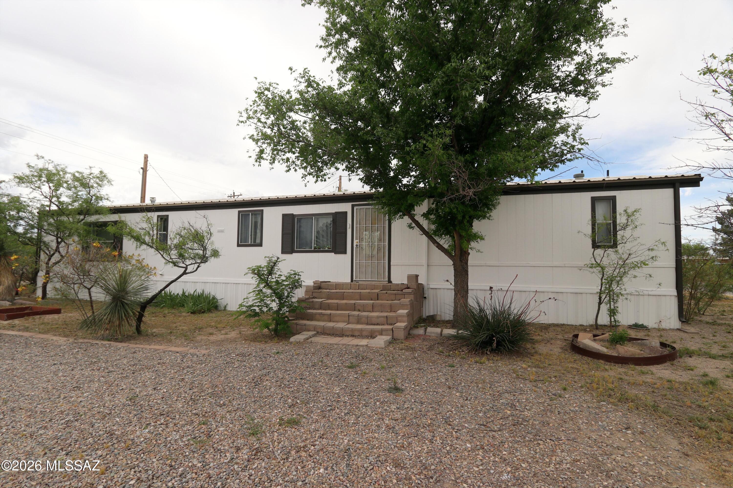 Cute little 3-bedroom 2-bathroom home on a corner lot.  Well maintained, and walking distance from the hospital. Metal roof, fresh paint, and only 5 minutes to the grocery store, schools, and other amenities. Hooked up to city water, sewer, natural gas, and city electric. Enjoy what Willcox has to offer, such as wine festivals, rodeos, car shows, and other fun events. Hop on I-10 and you are only an hour and 20 minutes from Tucson or have an easy commute to other surrounding areas such as Tombstone, Safford, Benson, Sierra Vista.