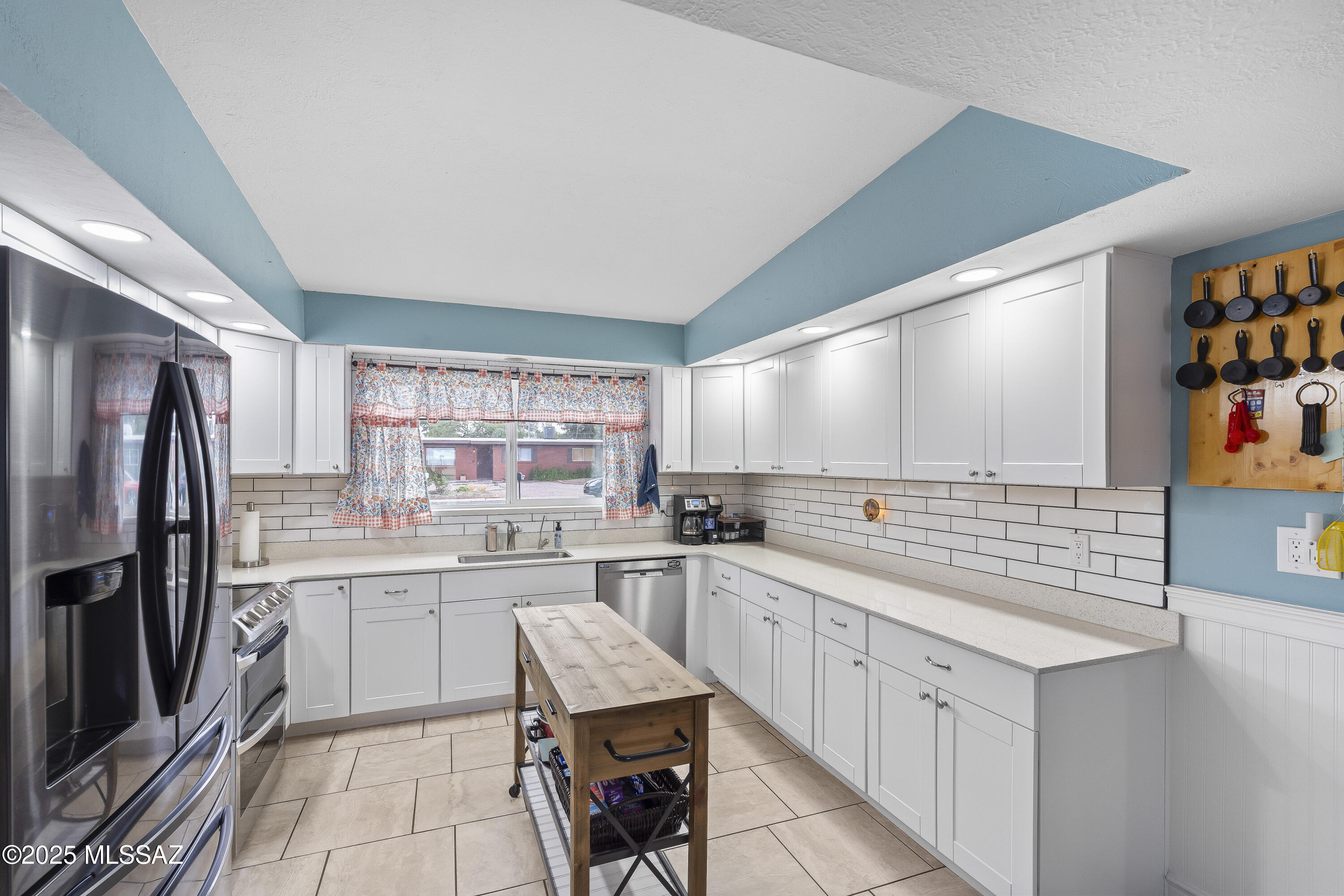 NO HOA . Great eastside location. Beautifully Remodeled Home. Large, open kitchen with Corian counters and loads of cabinets, newer Appliances including refrigerator, new windows, soft water system with R /O water, newer HVAC & Water heater, Roof recoated 5/2026 3yr warranty. one touch hidden cabinets/pantry in hallway, All New in 2022/2023. large dining room with original pocket doors and access doors to covered back patio. Cozy living room with brick fireplace. large main suite double closets, make-up vanity, and beautiful on suite bath. Additional 3 bedrooms are bright and generous in size.  XL Secure RV parking. 2 large tuff sheds with power and lighting  2 car covered parking with circular driveway. Large corner lot with Unobstructed Mountain views. VA Assumable loan 3.99% Vets Only.