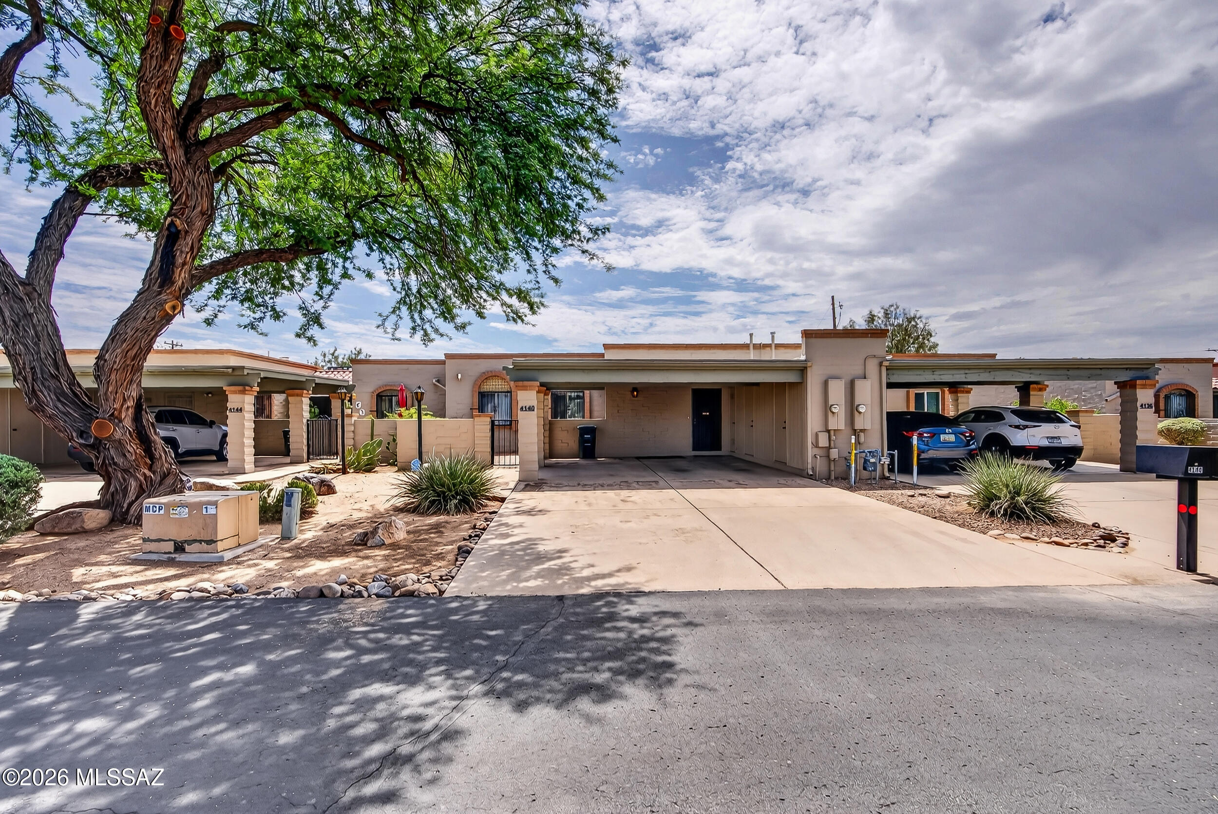 Discover easy Tucson living at 4140 E Megan Drive! This spacious single level townhome offers 3 bedrooms, 2 bathrooms and approximately 1,448 square feet in a convenient Midtown Tucson location. Step inside to a comfortable living space featuring a classic beehive fireplace, generous room sizes and plenty of natural light. A private courtyard entry and covered patio offer additional space to enjoy Tucson's outdoor lifestyle. Additional features include covered parking, extra storage and access to the community pool and spa. Conveniently located near shopping, dining, parks, medical services and major routes throughout Tucson.
