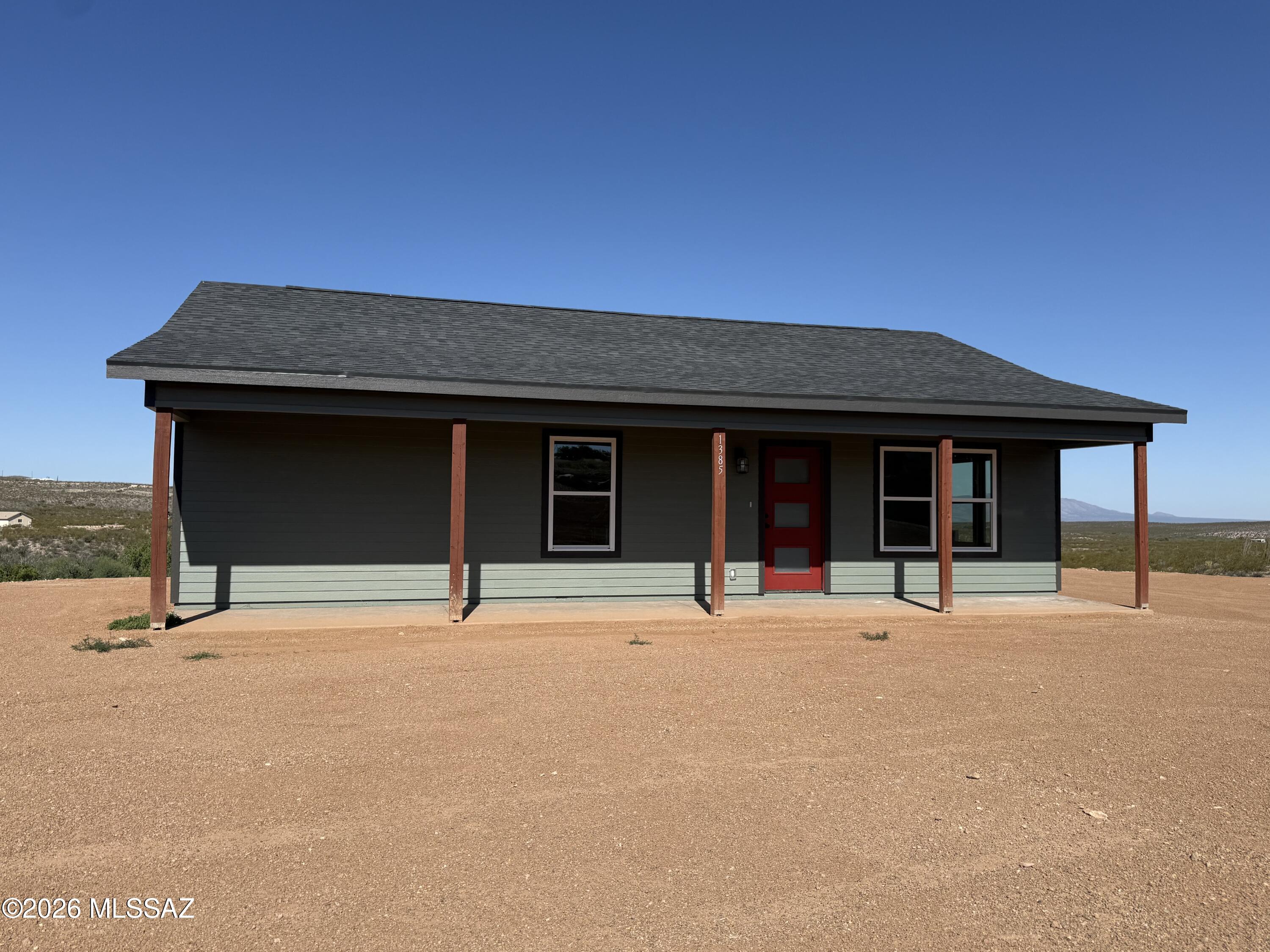 Brand new build in the old west! Come check out this new build in the Town Too Tough to Die, just minutes away from the action of Allen st. This home sits upon a stunning view lot that looks over the valley below and surrounding mountains. This home was built with top notch materials and quality craftsmanship. Step inside this home and notice the high 9' ceilings, butcher block breakfast bar and granite counter tops. Kitchen is bright and airy with all of the essentials. Master bedroom is large and has a sliding glass door out to the stamped concrete covered patio. Master bath has dual vanity with large tiled, walk in shower. Walk in closet is spacious and bright with room for all of your apparel. Laundry area inside which is well lit and has top cupboards for your supplies. Guest bedroom is spacious and bright with large closet and heated with its own mini split for heating and cooling. Guest bath is open with tiled shower and glass doors. This home is heated and cooled with high efficiency mini splits in every room. This allows the owner comfort while not having a whole house HVAC system. You can heat and cool each room independently. Floors are LVP throughout with a gray/wood coloring which makes them aesthetically pleasing and easy to maintain. LED lighting in the rooms and bathrooms, ceiling fans as well. City provided water and brand new septic systems. This is worry free living at its finest.