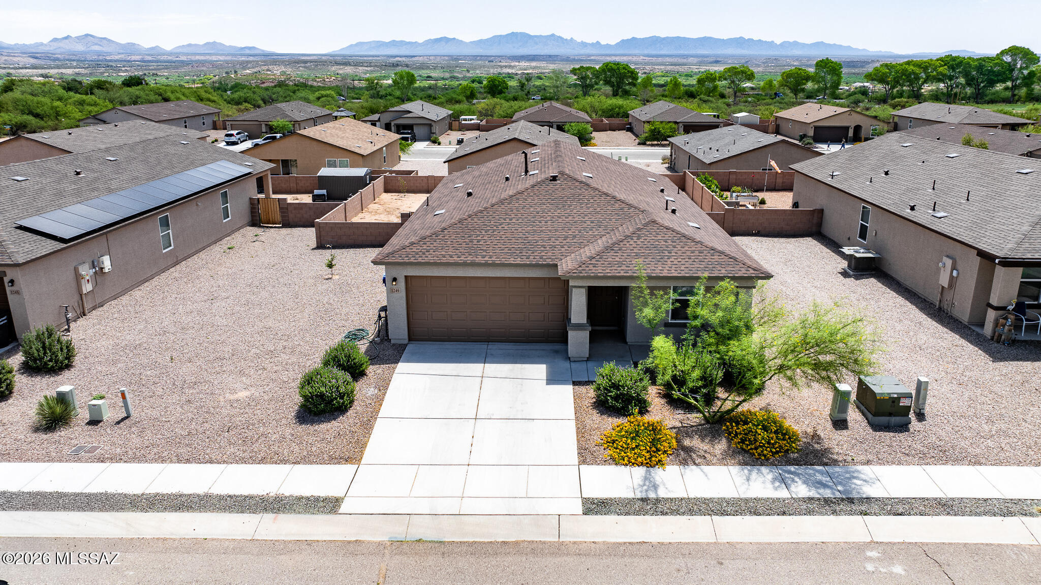 Motivated seller offering up to $5000 concessions w/ acceptable offer. Experience modern amenities & comfort in this well-designed 2024 built home. Open living concept creates a spacious layout that enhances relaxation & connectivity. Kitchen offers granite countertops, stainless fridge, range, dishwasher, hood & microwave. Primary suite features walk-in closet, private bath & dual vanity. 2 add'l bedrooms & hall bath are ideal for families & guests. Situated on an elevated lot the back yard provides views & privacy everybody is looking for. Your ideal retreat awaits!