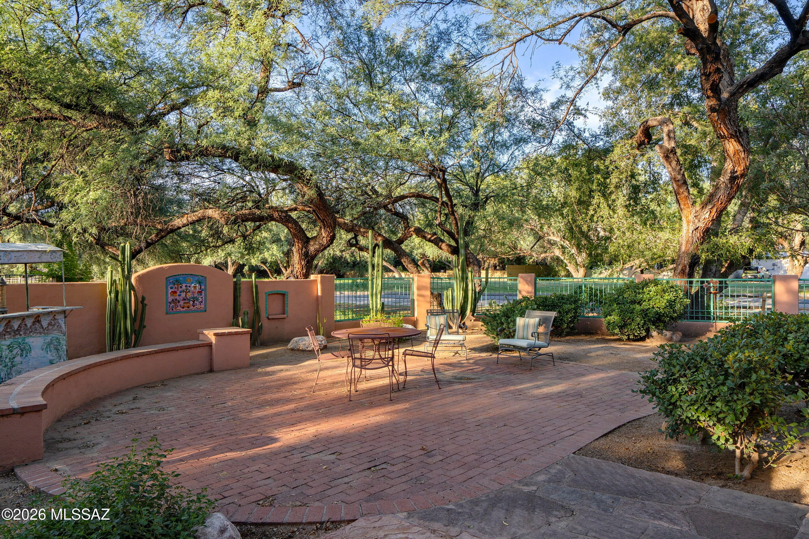 True southwest home with unmatched artistic flair! Corner lot home sits on the 8th tee box of 49ers golf course & is surrounded by mature shade trees. Original owner & current seller is a local well known pottery artist, so this home is rich with color & unique custom touches! This energy efficient home is built using Ener-G  Block ICF insulated concrete forms offering R50 walls & R38 ceilings. You are welcomed through a large front courtyard to the entry door. Inside find plenty of rooms for entertaining & hobbies with a full 2 room art studio, 4 bedrooms, a versatile heated and cooled Arizona room, generous kitchen & the coziest family room with a gas kiva fireplace. Back yard faces the golf course, covered in shade trees, has an extended covered patio & 3 large sheds. HOA is voluntary.