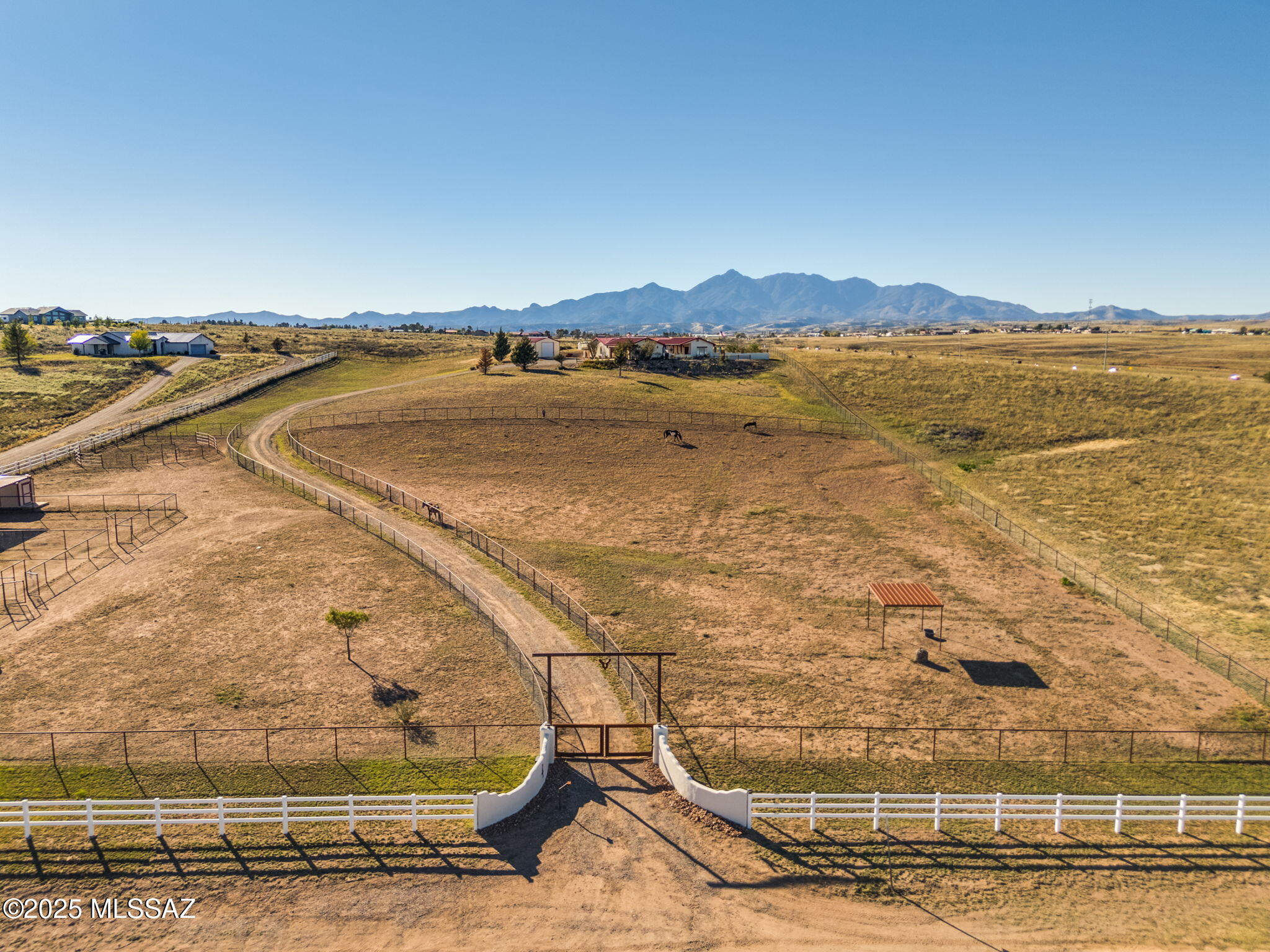 Luxury Equestrain Living Meets Arizona Wine Country.

A significant price improvement makes this extraordinary equestrian estate one of the best values in Sonoita.

Nestled in the heart of Arizona's renowned wine country, where elevations nearing 5,000 feet provide four distinct seasons and comfortably mild summers, 4 Mustang Trail offers an exceptional lifestyle surrounded by sweeping grasslands, mountain vistas, and endless skies.

Set on more than 8 pristine acres, this custom-built residence seamlessly blends luxury living with an exceptional horse facility. Featuring three spacious bedrooms, three beautifully appointed bathrooms, and thoughtfully designed living spaces, the home offers warmth, elegance, and effortless functionality. At its heart is a tranquil courtyard with a bubbling fountain--perfect for morning coffee, evening cocktails, or gathering with friends beneath Arizona's spectacular sunsets. Inside, soaring ceilings, rich finishes, abundant natural light, and an open great room create an inviting atmosphere designed for both entertaining and everyday living. A charming library nook offers the perfect retreat to unwind with your favorite book.

Equestrians will appreciate the professionally designed horse facilities, including a dedicated 40' x 60' barn, approximately 5 acres of top-rail, no-climb fenced turnout, and a layout designed for convenience and easy daily care.

Beyond horses, this property is equally impressive for hobbyists, collectors, and outdoor enthusiasts. In addition to the oversized three-car garage, a fully insulated 20' x 25' custom workshop with built-in shelving, three 110-volt circuits, and a wired 220-volt circuit offers endless possibilities for projects, storage, or equipment. Dedicated RV and boat parking ensures there's room for every adventure.

The backyard was designed with entertaining in mind, creating an outdoor extension of the home where family and friends can gather year-round while taking in the spectacular mountain views and unforgettable Arizona sunsets.

Finding a custom home with this level of craftsmanship, panoramic scenery, professional equestrian amenities, workshop space, and room to breathe--is becoming increasingly rare.

If you've been waiting for the perfect blend of luxury, horses, and Arizona's sought-after wine country lifestyle, this is your opportunity.