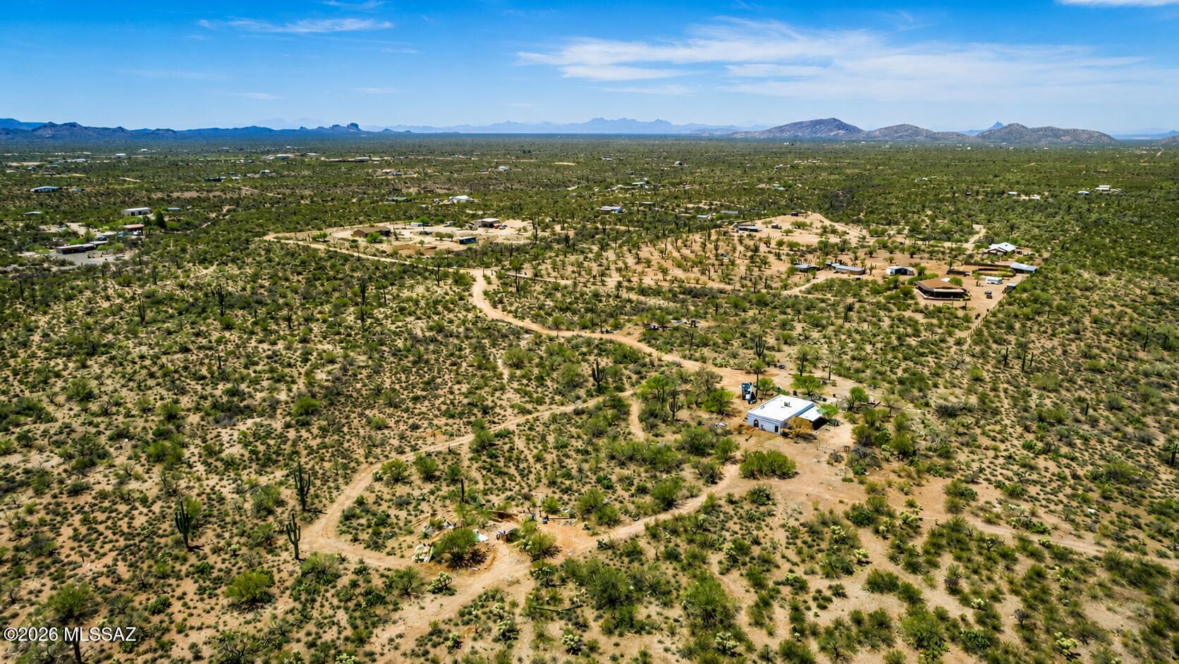 Step into 20 acres of pure Arizona tranquility. Tucked away in the peaceful outskirts of Saddlebrooke, this rare parcel offers direct access to expansive state land, giving you endless space, privacy, and panoramic views of the surrounding desert and mountains. Here, the stars shine brighter, the air feels cleaner, and the quiet is absolute. With all utilities already in place, this property is ready for your dream build--whether that's a sustainable off-grid homestead, a self-sufficient retreat, or a private basecamp for outdoor adventure. The land is ideal for solar power, rainwater collection, livestock, gardens, or simply enjoying life surrounded by natural beauty.