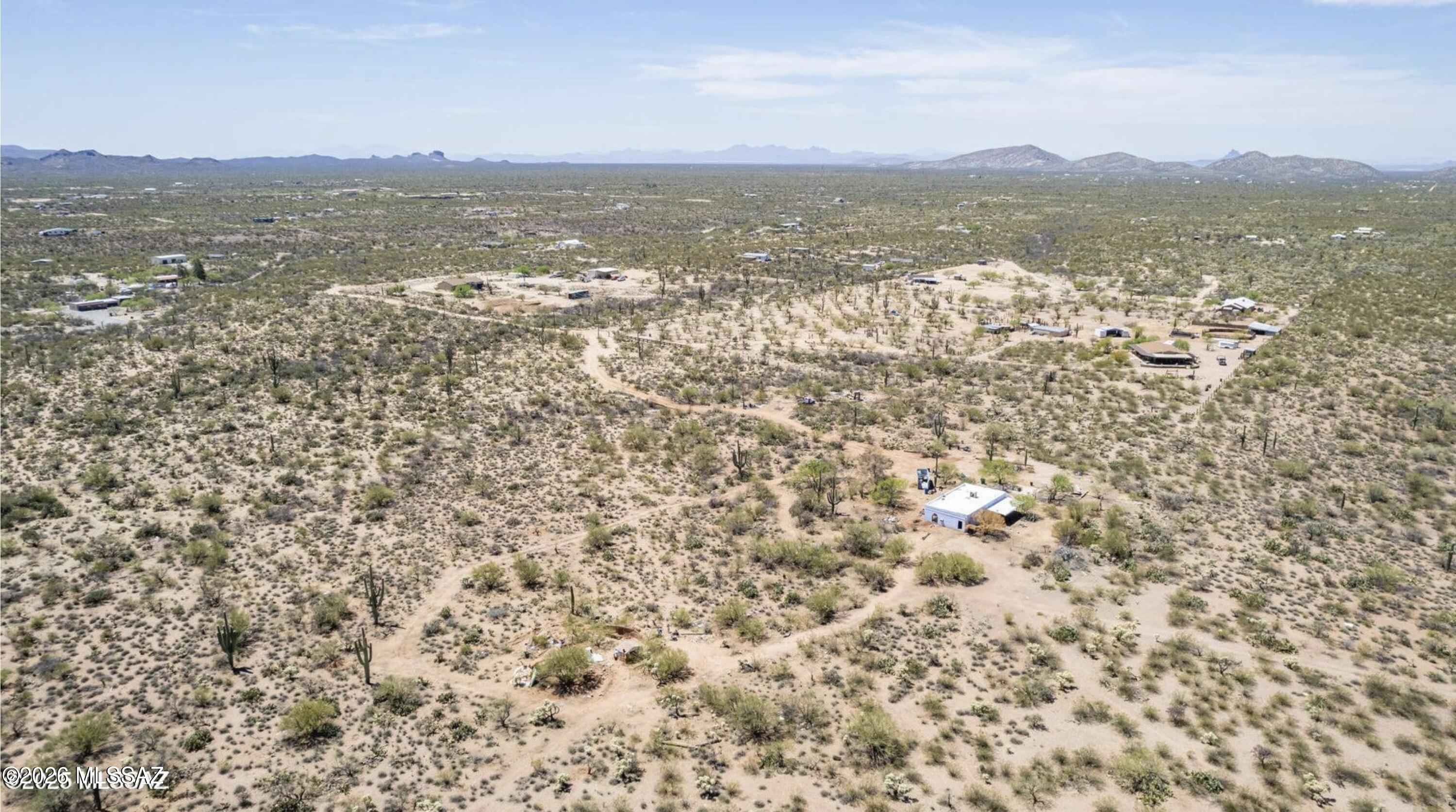 Step into 20 acres of pure Arizona tranquility. Tucked away in the peaceful outskirts of Saddlebrooke, this rare parcel offers direct access to expansive state land, giving you endless space, privacy, and panoramic views of the surrounding desert and mountains. Here, the stars shine brighter, the air feels cleaner, and the quiet is absolute. With all utilities already in place, this property is ready for your dream build--whether that's a sustainable off-grid homestead, a self-sufficient retreat, or a private basecamp for outdoor adventure. The land is ideal for solar power, rainwater collection, livestock, gardens, or simply enjoying life surrounded by natural beauty.