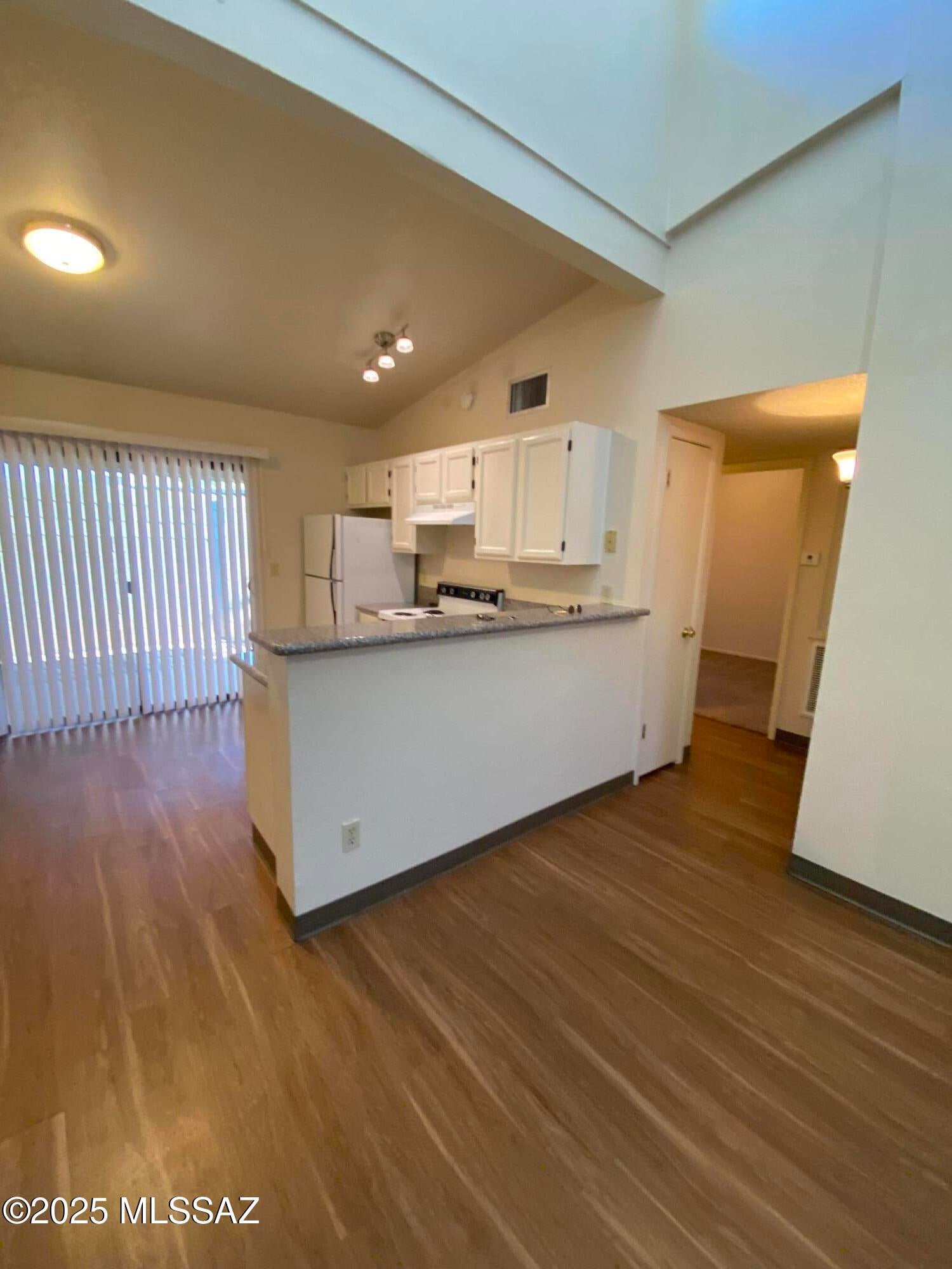2 BR 1 BA Water included, tenant pays Electric Only. Laundry Room off back patio with Hook ups for your washer and dryer. 1 parking space. Vinyl plank flooring in Bath, Kitchen and Living room. Central AC. Corner electric fireplace for cozy ambience., carpeted bedroom. Vaulted ceiling.
