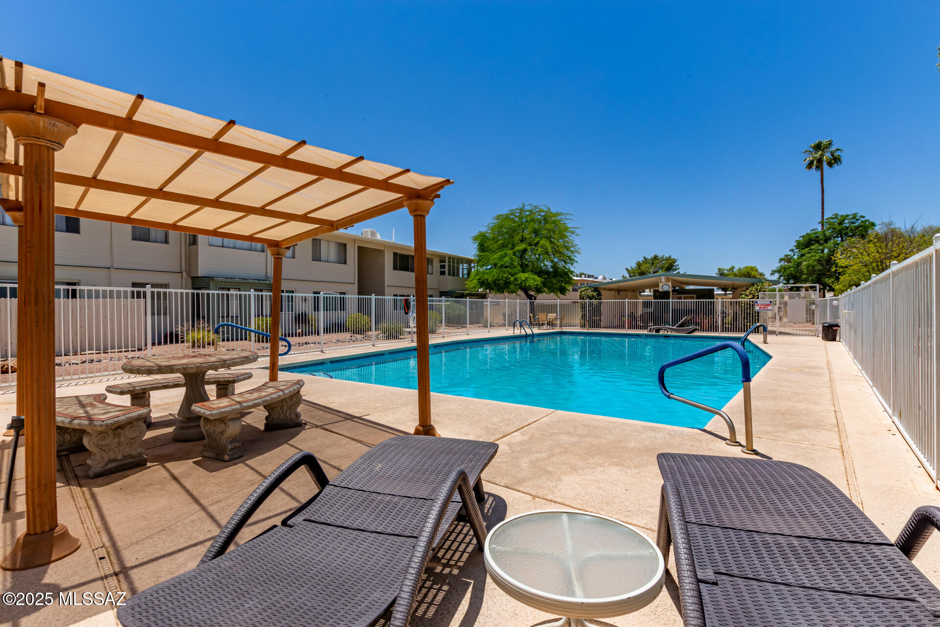 Welcome to this charming two-bedroon, one bathroom ground floor home in desirable Echo Ridge II.
Updates include plantation window shutters, vinyl plank flooring, central air conditioning for comfort, dual pane windows, convenient assigned covered parking, and a bonus room perfect for crafts or remote work.
Community amenities  boast a solar heated salt water swimming pool and a relaxing ramada with nearby gas BBQ grills. Low monthly fee covers exterior building maintenance, sewer, trash, water, gas, property tax, and much more......Perfectly situated for effortless living. Don't miss out!