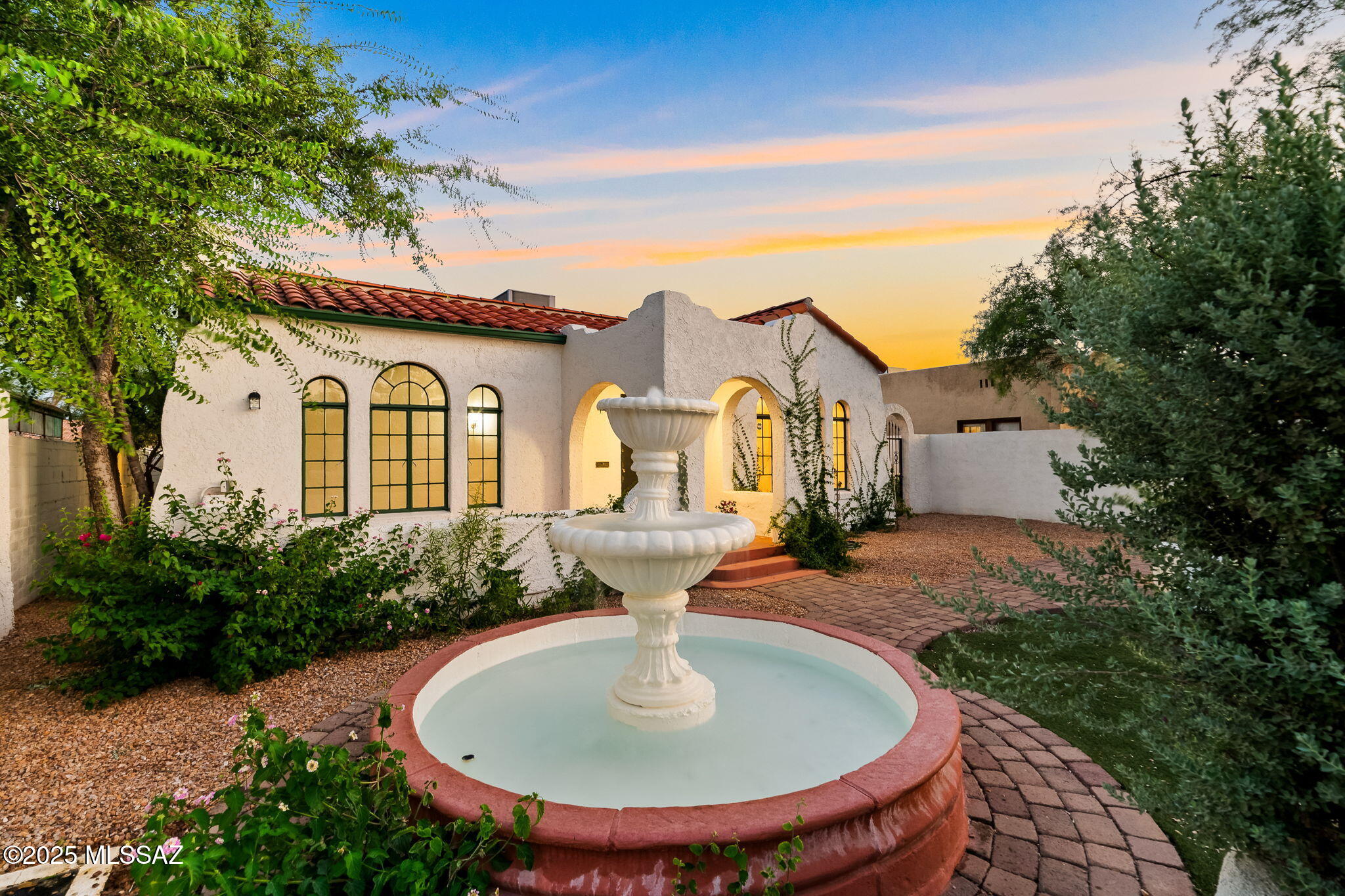 Step back in time while enjoying modern comforts in this beautifully preserved 1930s revival nestled in the heart of the sought-after Sam Hughes neighborhood. The home exudes timeless character, boasting original features like the front door, Spanish-tiled fireplace, original windows, and stunning refinished hardwood floors throughout.

This charming home is perfectly complemented by an expansive 832 sq ft basement—ideal for a home gym, office, or additional storage. Plus, you'll find a 638 sq ft attached 1-bedroom, 1-bath guest house, perfect for visitors or rental income potential.  See More!