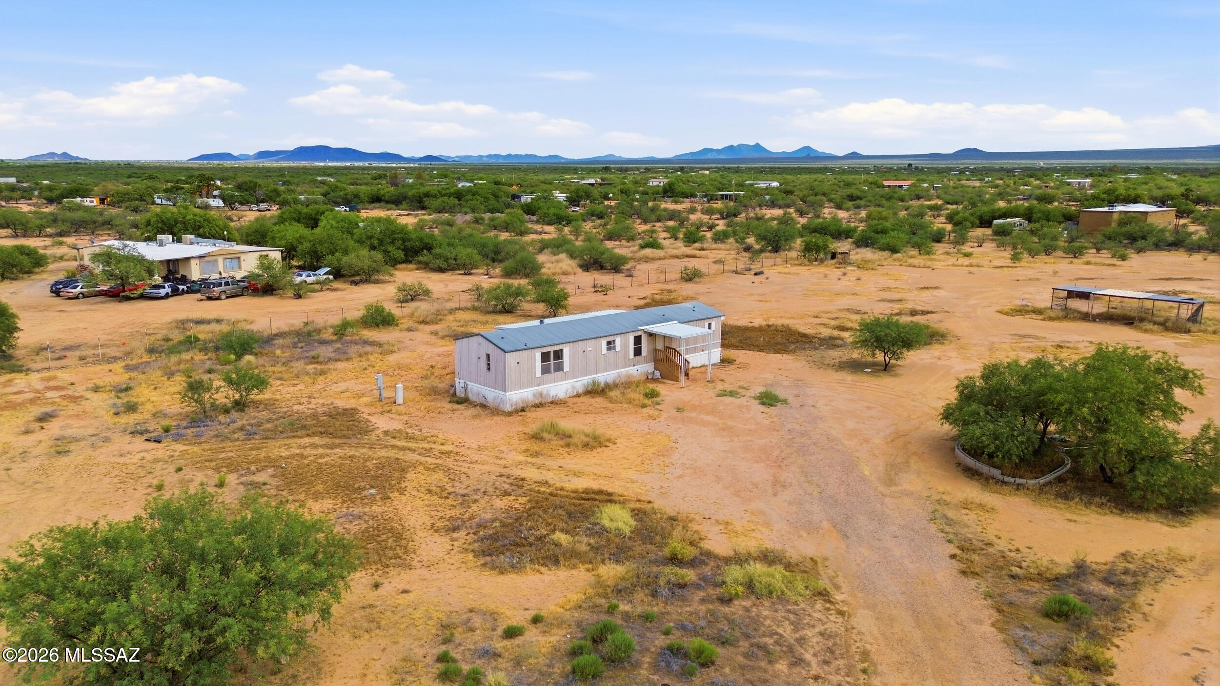 3 bedroom 2 bath manufactured home situated on 4.14 acres in Tucson, AZ. This property offers the perfect blend of privacy and open space, with plenty of room to enjoy the natural desert surroundings. Ideal for horse enthusiasts and those seeking a rural lifestyle.
The home features a functional floor plan with comfortable living areas, a well appointed kitchen, and ample natural light throughout. The expansive lot provides endless possibilities. Bring your animals, build additional structures, or create your own outdoor oasis.
Enjoy wide open skies, mountain views, and the freedom of country living while still being within a convenient distance to Tucson amenities.