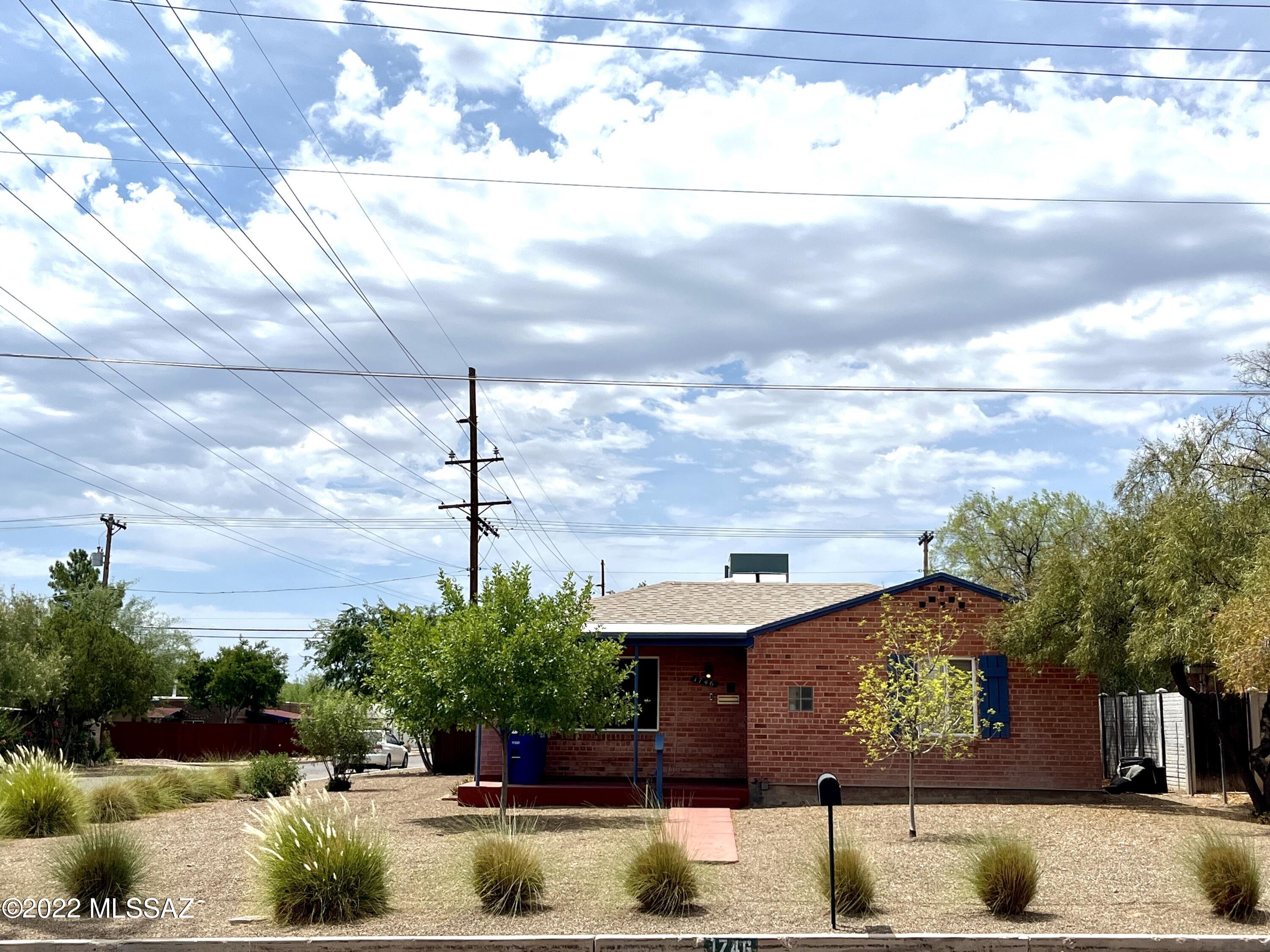 Excellent rental opportunity near the U of A and Central midtown living. If you appreciate Mid-Century appeal than you will love this home. Original vintage metal kitchen cabinets, with new lighting fixtures. Two new A/C units, 3 separate entrances, large corner lot with off street parking and a carport. Don't wait on this one, it's priced to sell! Call today for your private showing! Pets considered with landlord approval. Owner/Agent.
