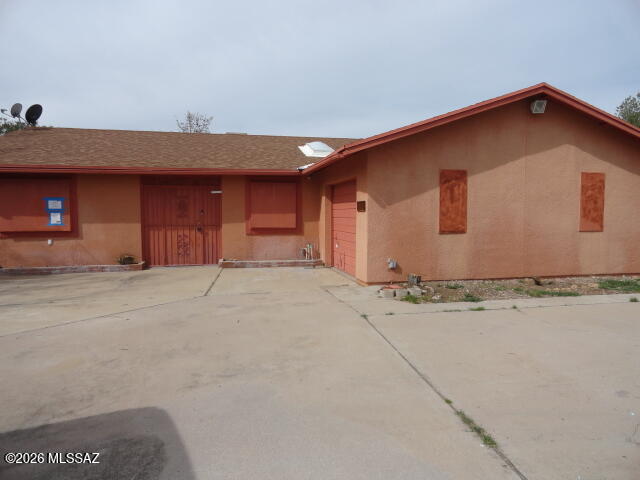 You will love the hilltop location from this home! The view goes on forever. There is an open living area and a spilt floor plan. The master is good size and has a walk in closet. The secondary bedrooms are also good size and have a convenient bath on that end of the house. Off the living area you will find a large Arizona room. This home fautes an oversized 1 car garage with laundry area. This is a great opportunity! This is an AS IS sale.  ''Due to condition, the property may have health/safety risk(s). Prior to entry / access, all parties must sign a Hold Harmless Agreement and
the property may only be shown by appointment''