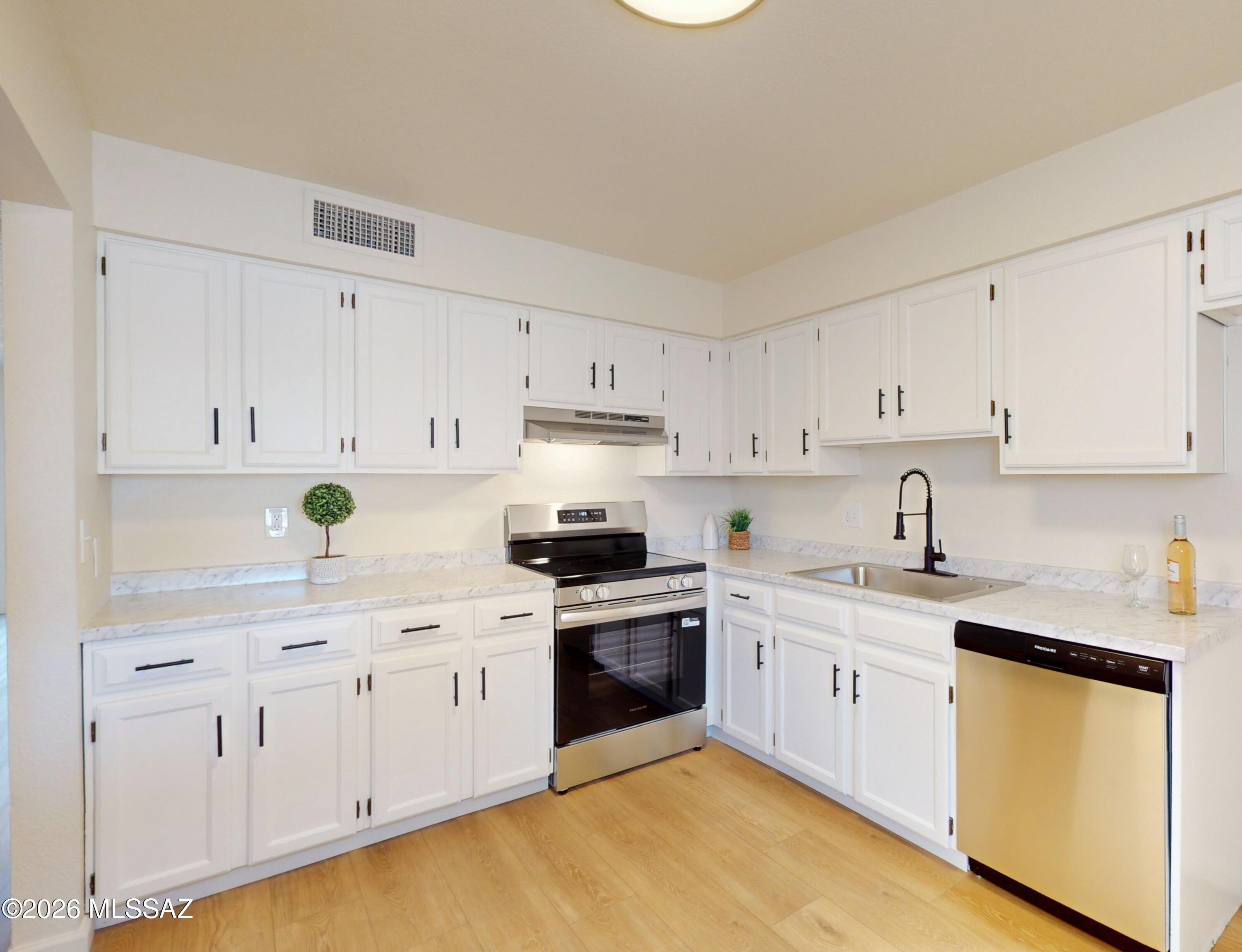 Fully remodeled 2-bedroom, 2-bath townhome in a prime central location. This move-in ready property features brand-new flooring, carpet, appliances, fixtures, and modern kitchen countertops. Enjoy convenient access to nearby shopping, dining, and the mall, along with a community pool for those hot summer days.