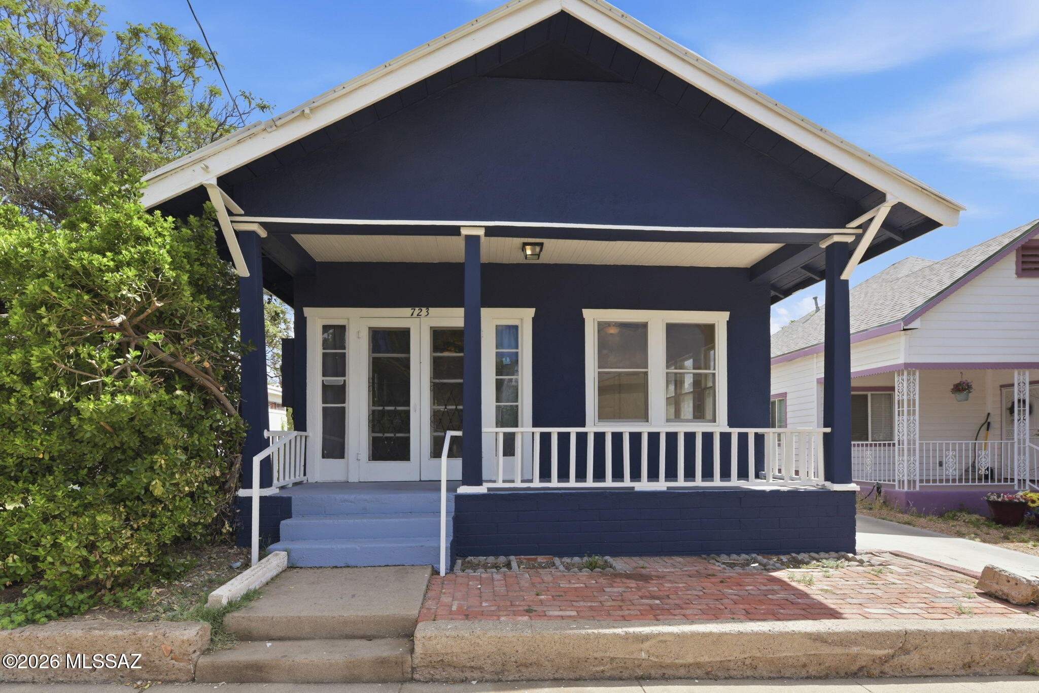 Welcome to this charming home, featuring recent completed enhancements! Featuring a beautiful, front porch, polished hardwood floors and fresh paint inside and out. The home allows for plenty of natural light to stream in giving it a warm & inviting atmosphere. With high ceilings and a mini-split system for efficient heating and cooling, it offers comfort and unique style. The kitchen includes a convenient pantry for storage, and there's a dedicated laundry room for added functionality. Each bedroom features a walk-in closet, offering generous storage space. The home has a front porch that provides ample shade and delightful views of the neighborhood and surrounding hills! Perfect as a starter home or an investment property! Don't miss out on this unique opportunity!